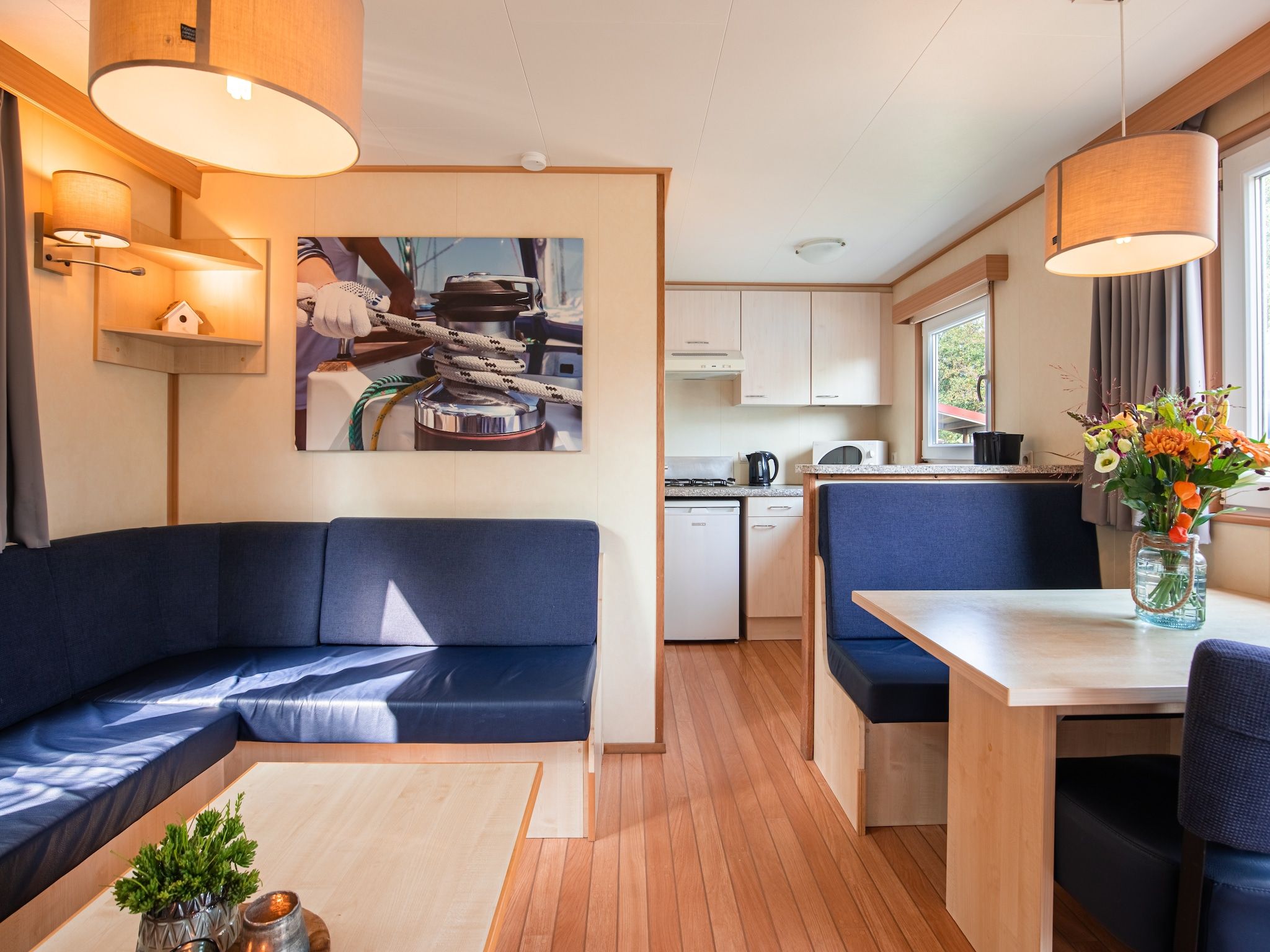 De woonkamer van Vakantiepark Leukermeer 3 in Well