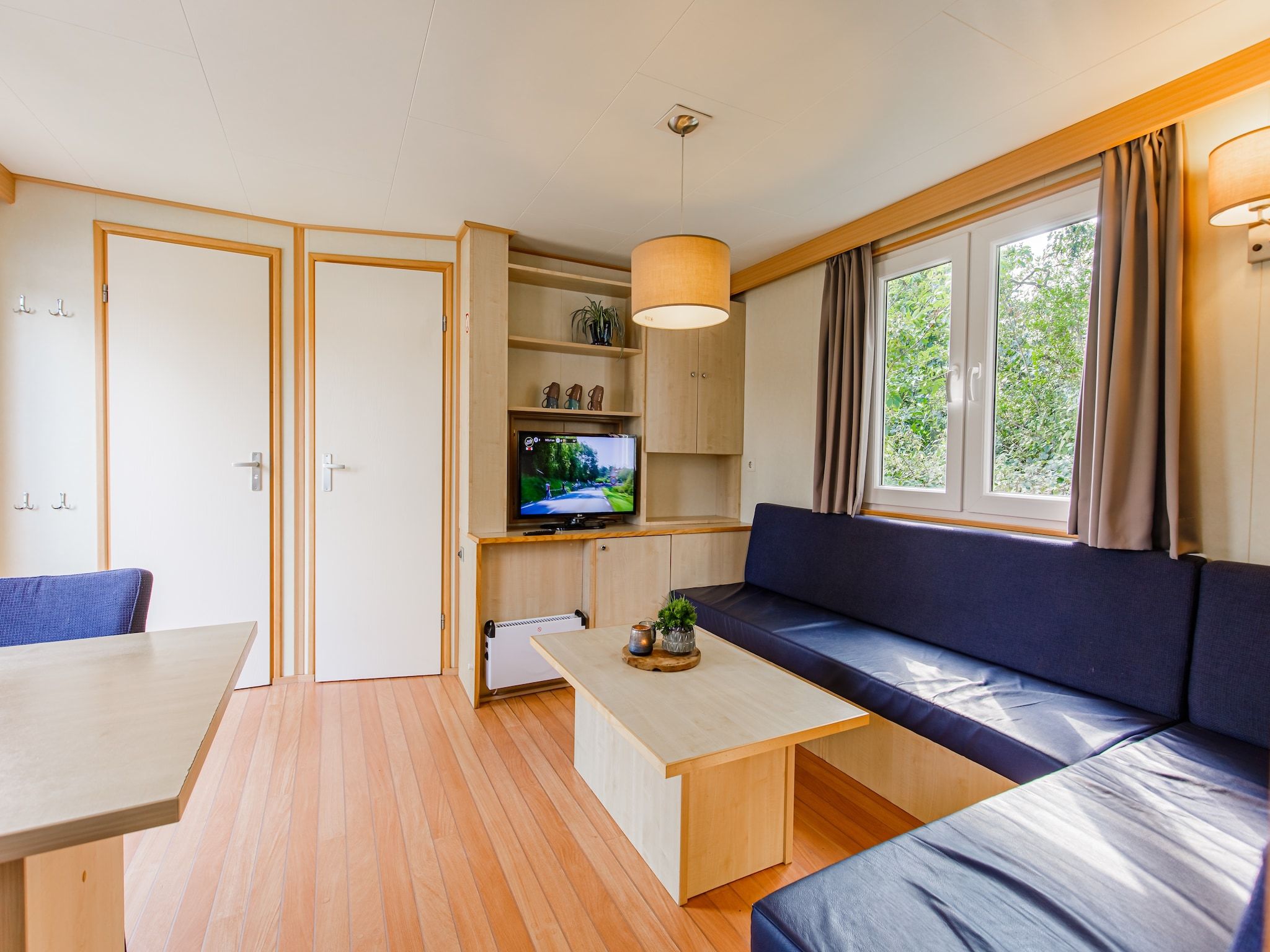 De woonkamer van Vakantiepark Leukermeer 4 in Well