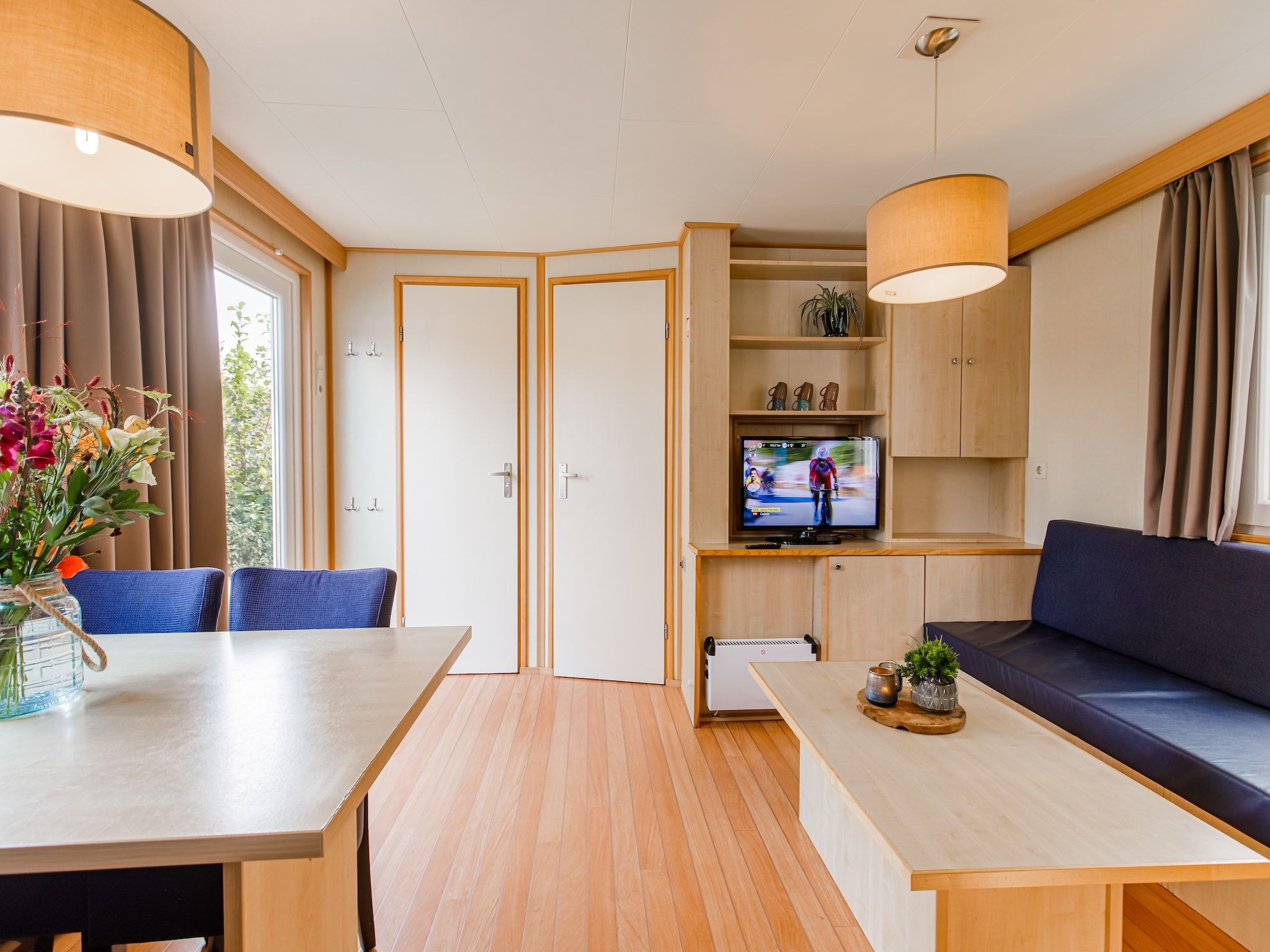 De woonkamer van Vakantiepark Leukermeer 6 in Well