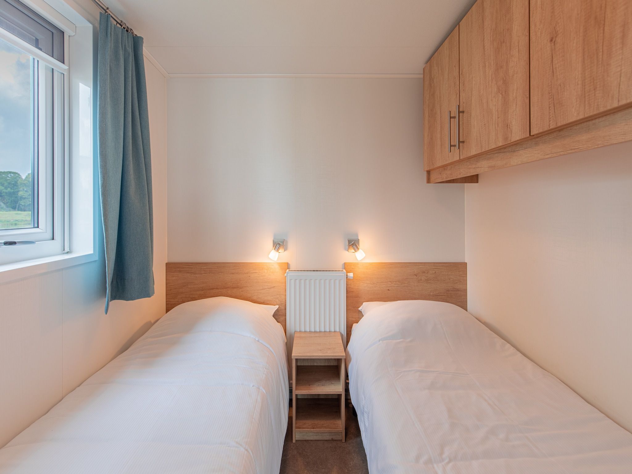 Een slaapkamer van Vakantiepark Leukermeer 9 in Well