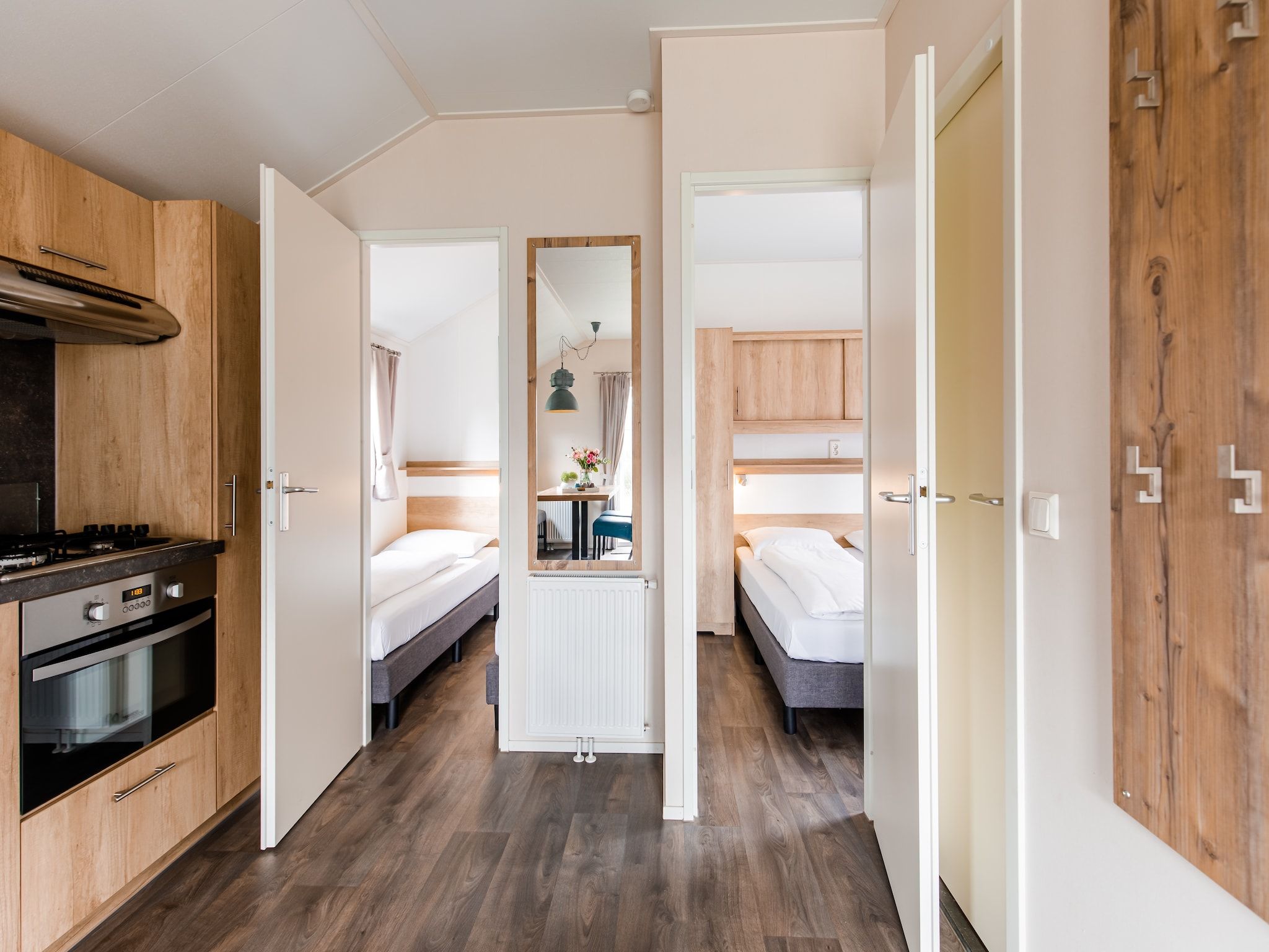 Een slaapkamer van Vakantiepark Leukermeer 11 in Well