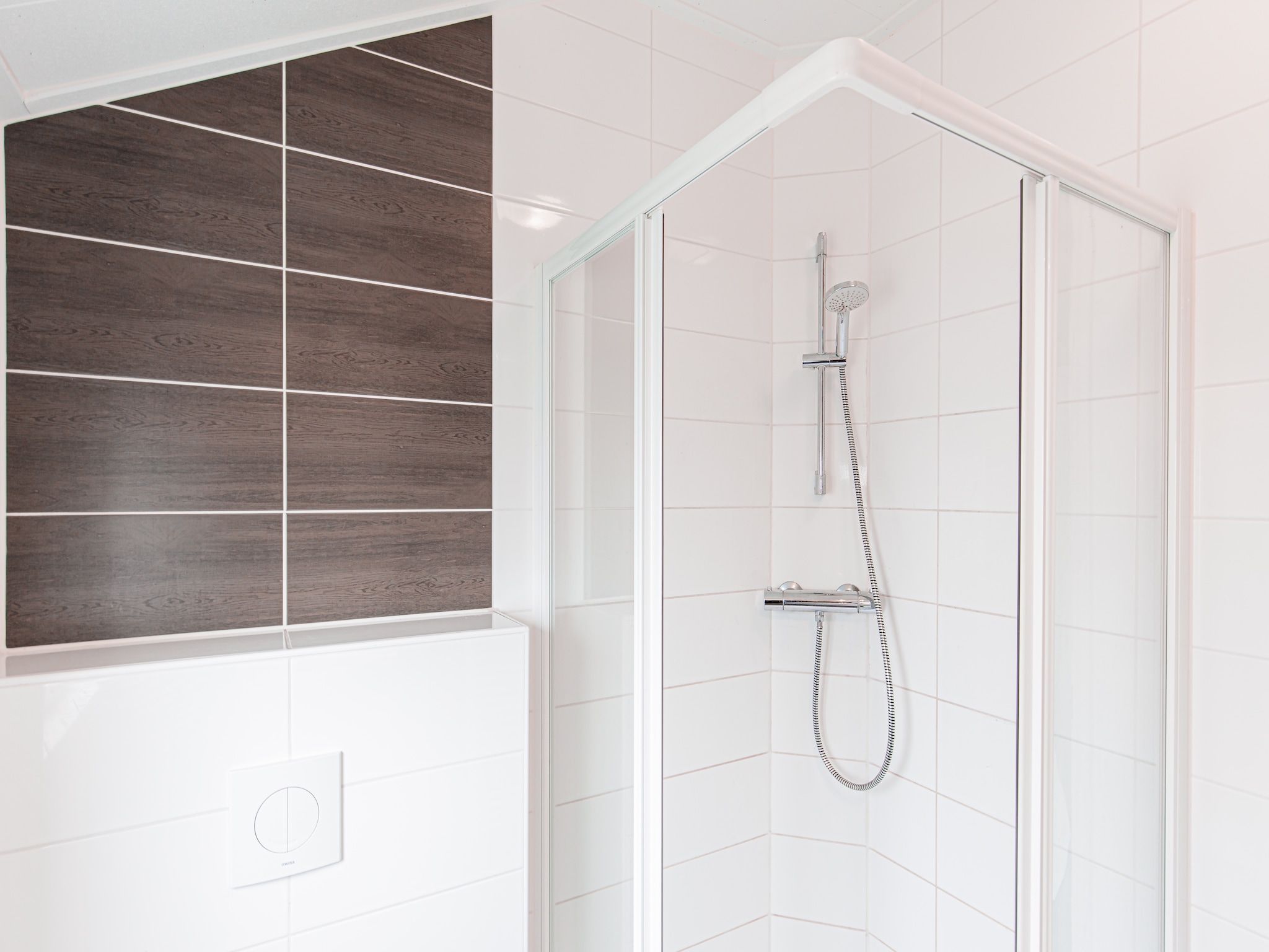 De badkamer van Vakantiepark Leukermeer 11 in Well