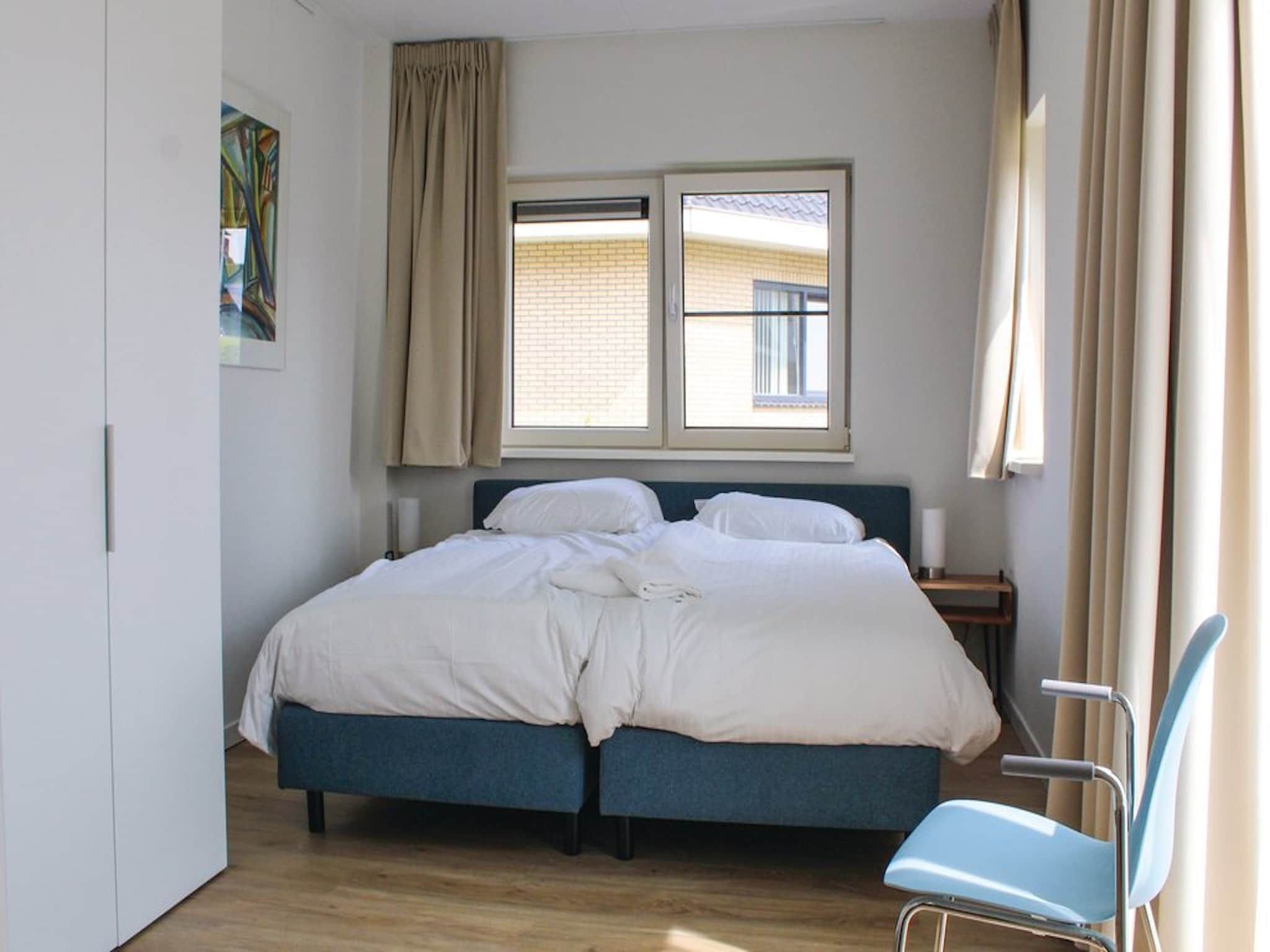 Een slaapkamer van Recreatiepark Idskenhuizen 4 in Idskenhuizen