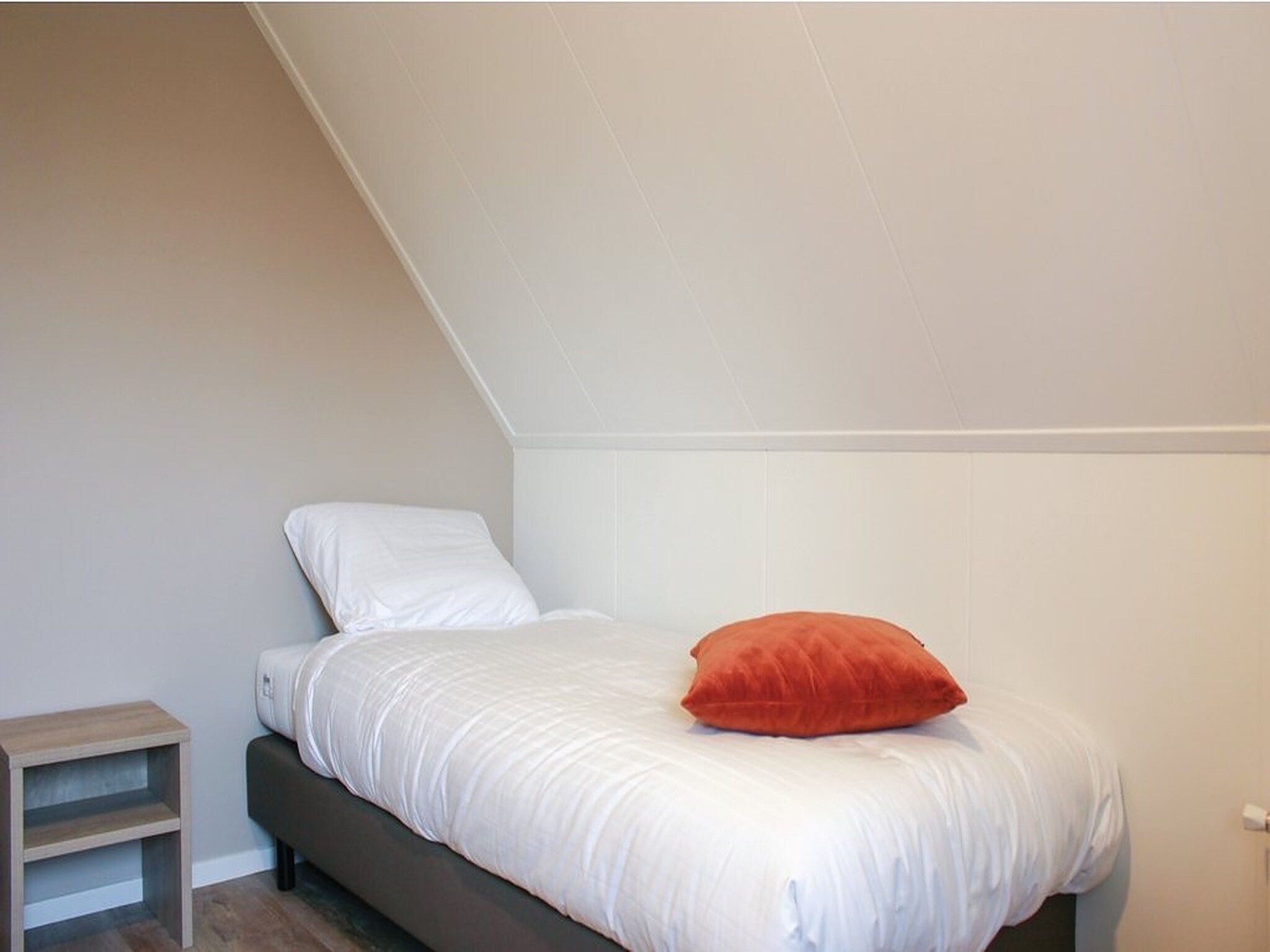 Een slaapkamer van Recreatiepark Idskenhuizen 7 in Idskenhuizen