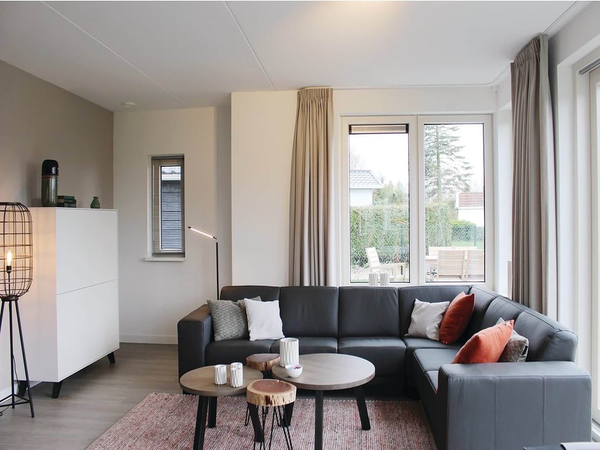 De woonkamer van Recreatiepark Idskenhuizen 9 in Idskenhuizen