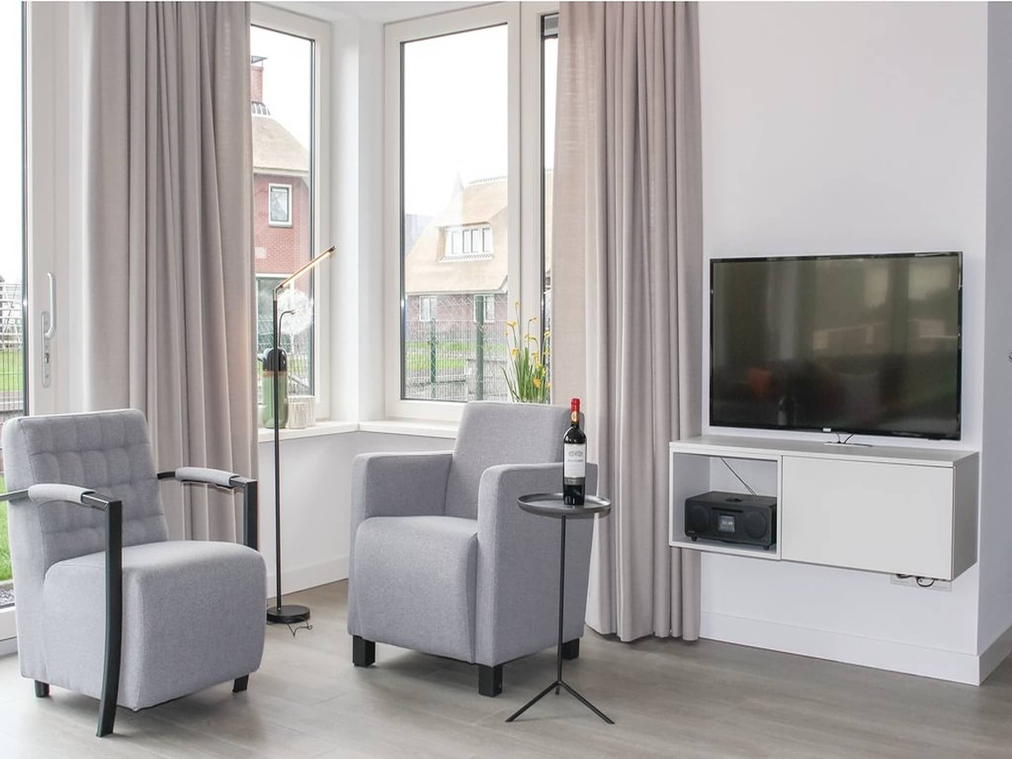 De woonkamer van Recreatiepark Idskenhuizen 9 in Idskenhuizen