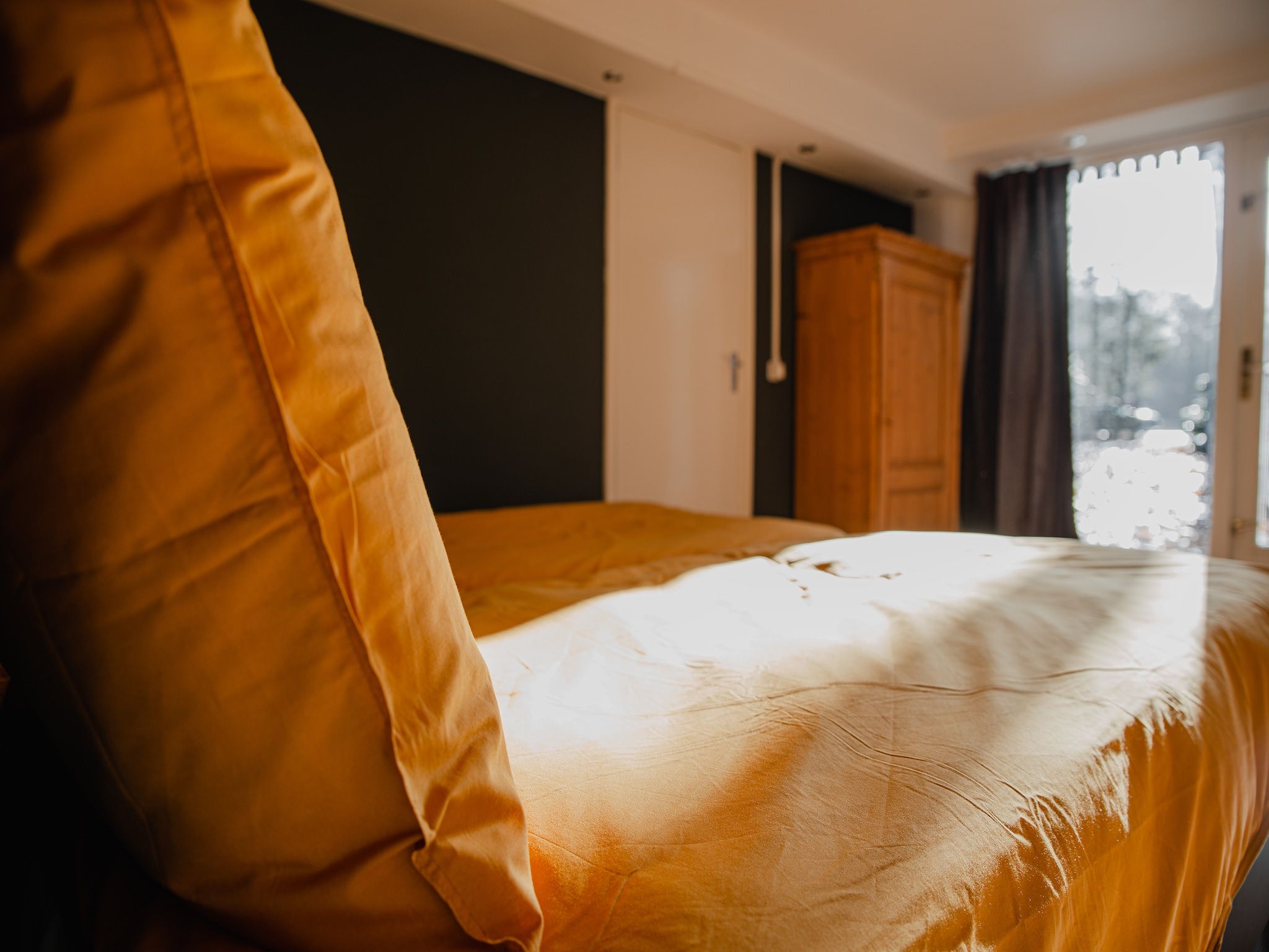 Een slaapkamer van Dorpswoning Het Jagershuis in Leende