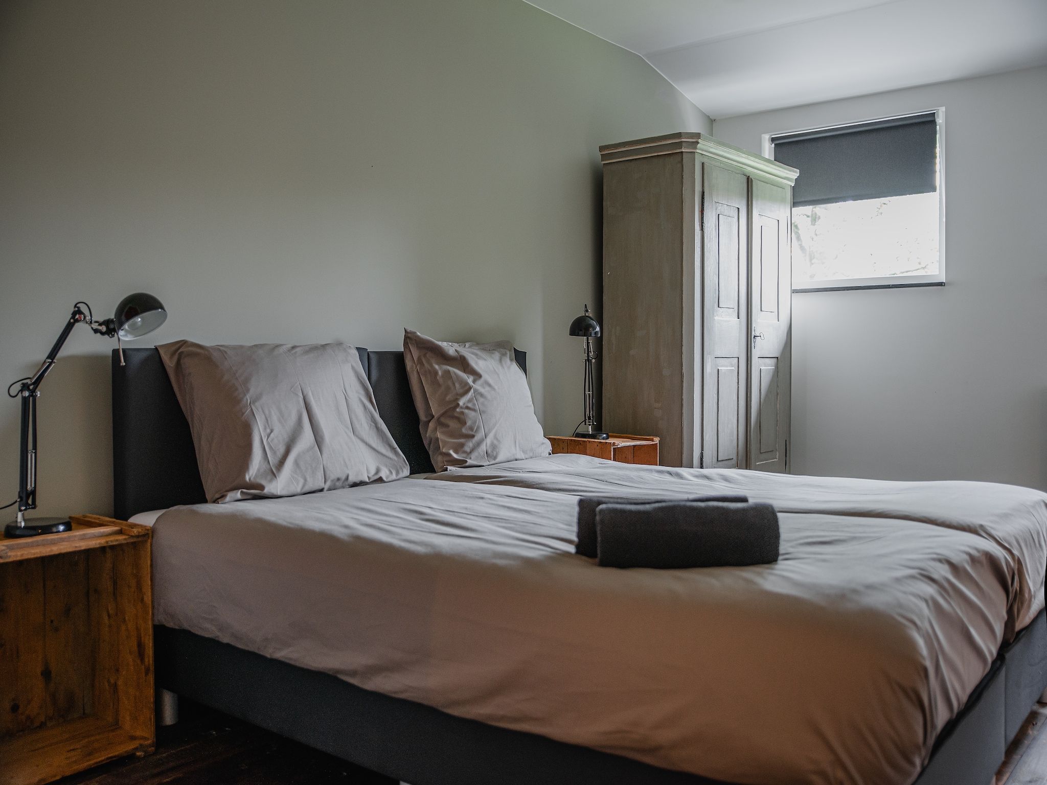 Een slaapkamer van Dorpswoning De Volbloed in Leende