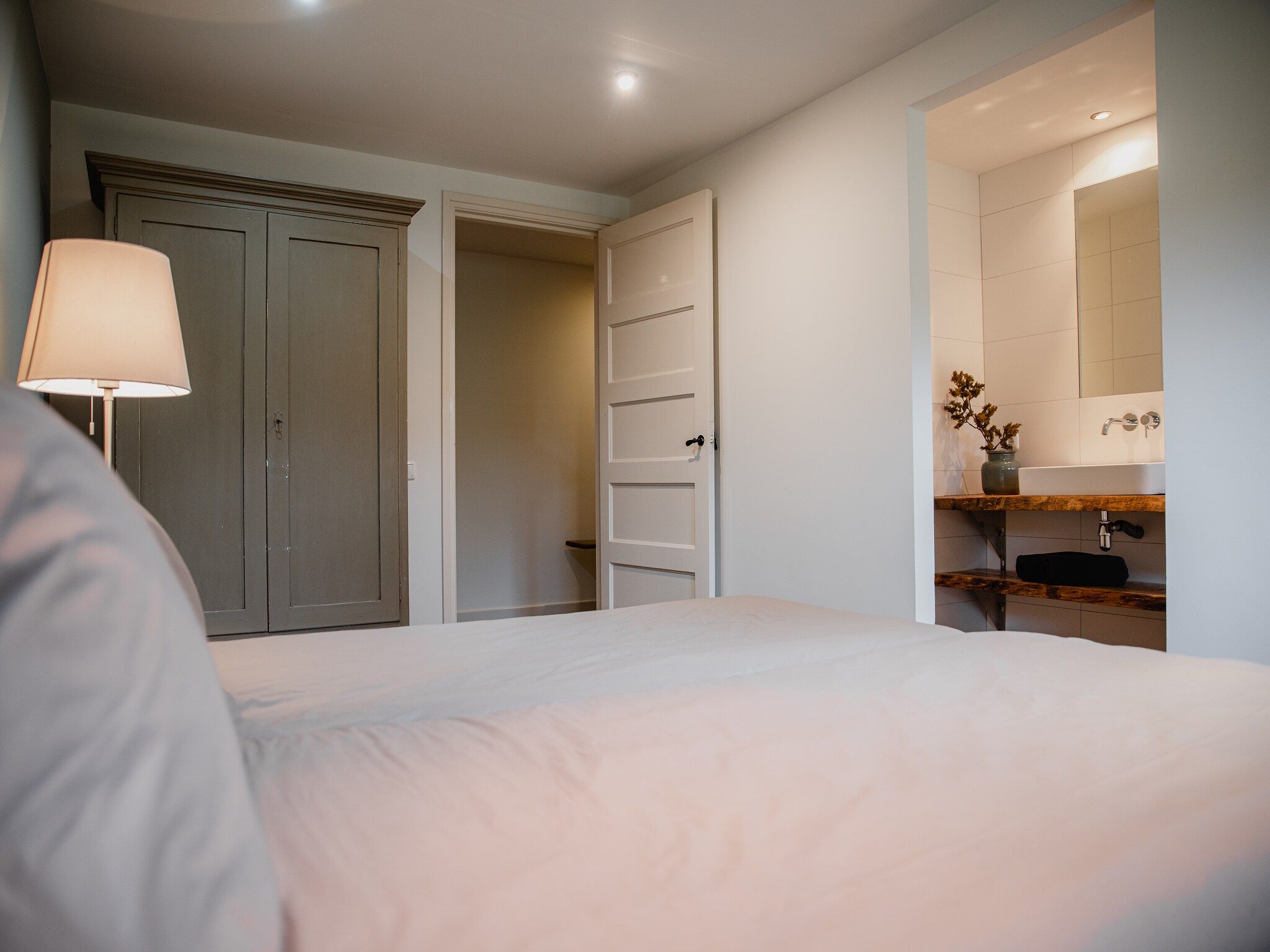 Een slaapkamer van Dorpswoning De Volbloed in Leende