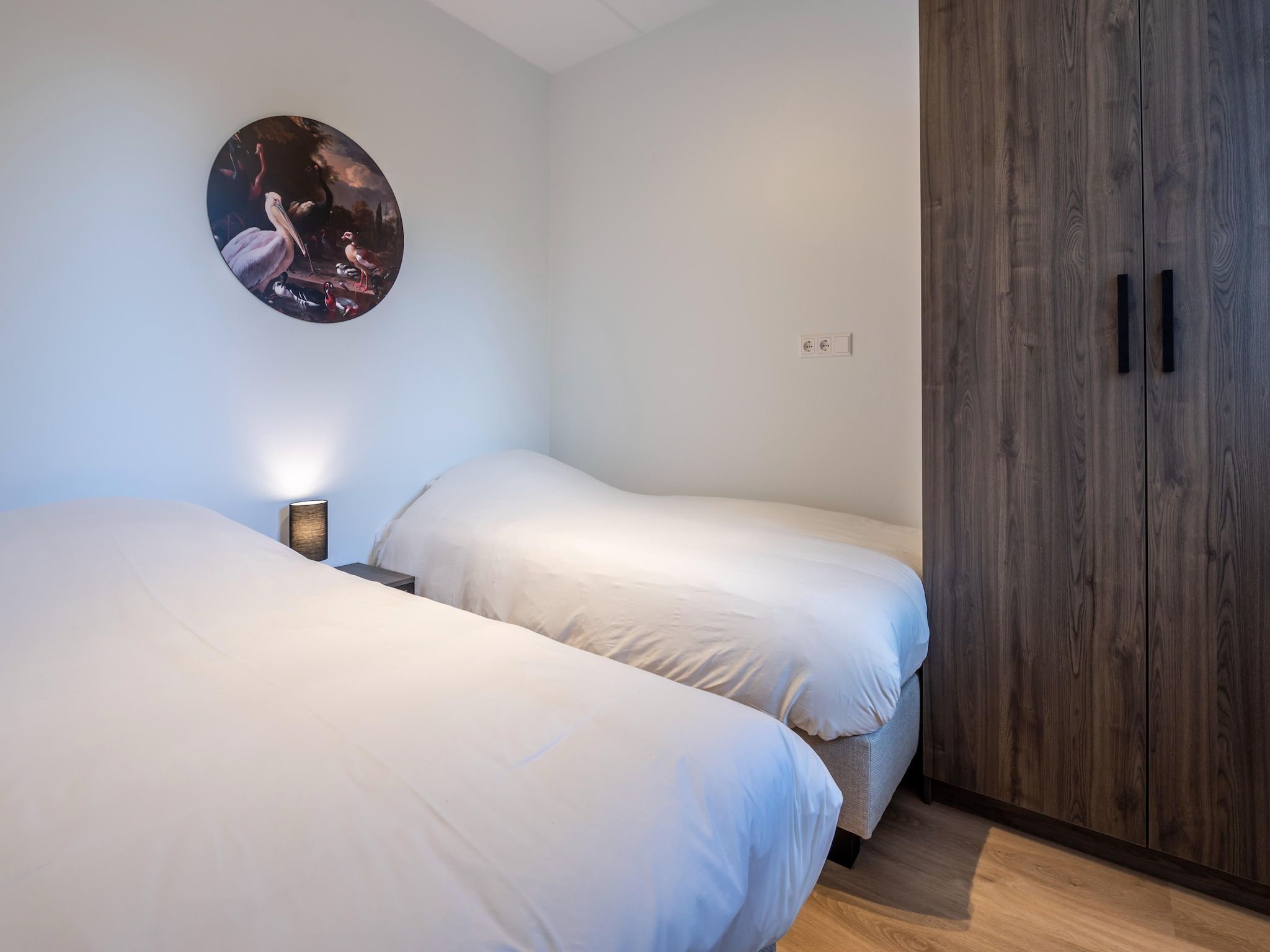 Een slaapkamer van Harbour Loft 1i Résidence Marina havenzicht in Kamperland
