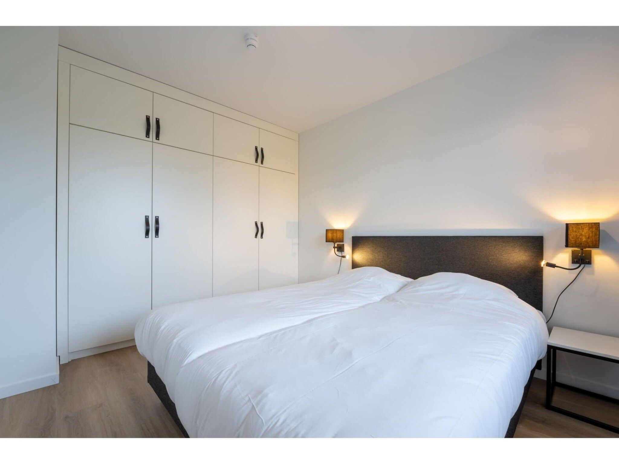 Een slaapkamer van Harbour  2E Loft wellness 6 personen in Kamperland