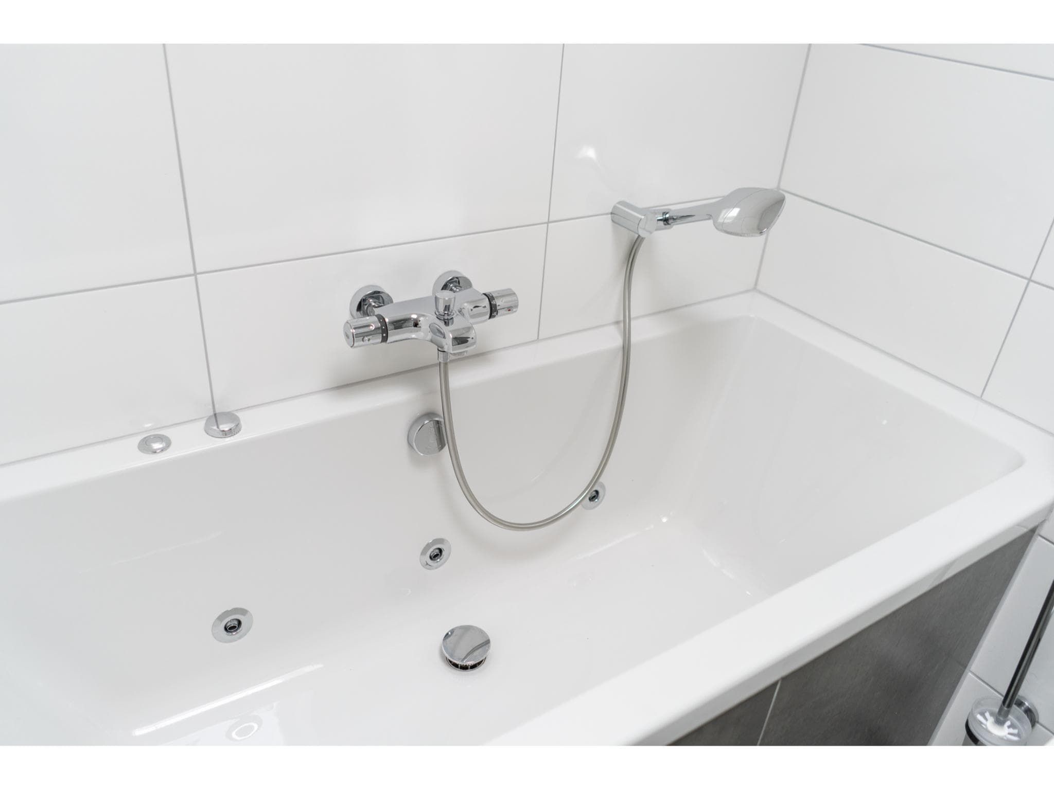 De badkamer van Golfvilla 39 Wellness in Hollum