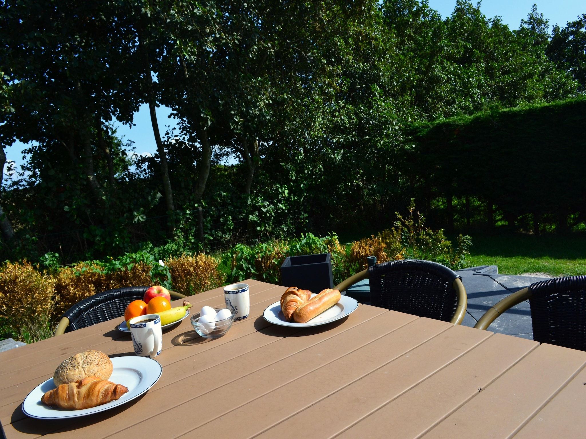 De tuin van Golfvilla 40 Comfort in Hollum