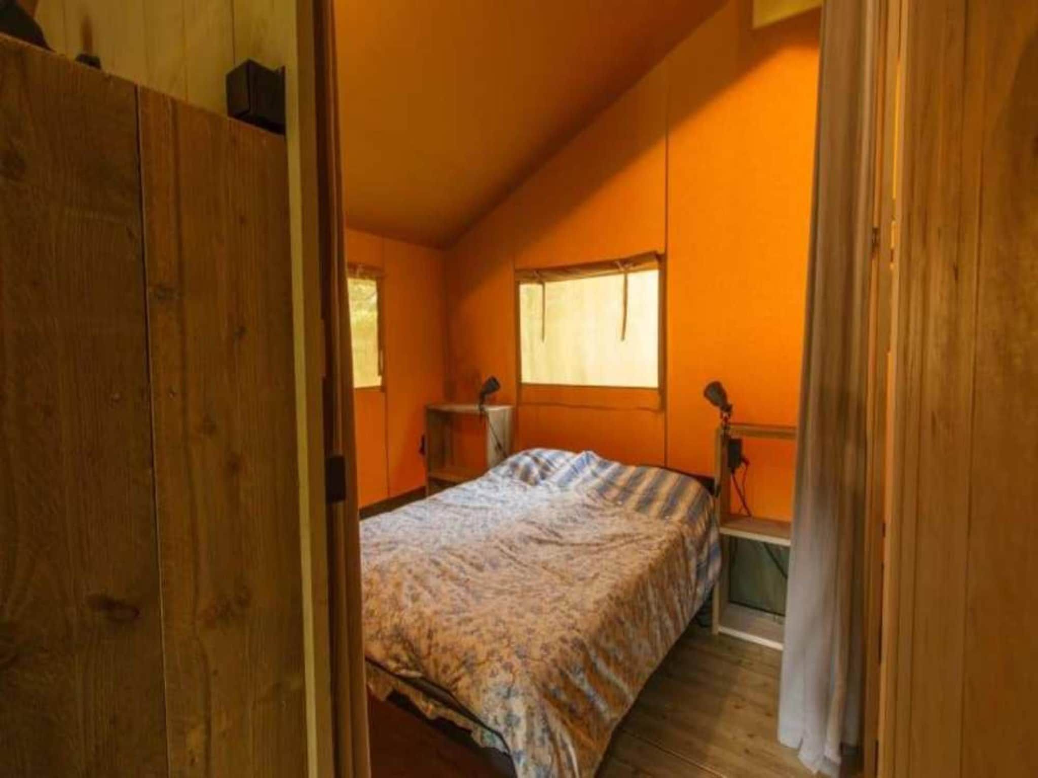 Een slaapkamer van Luxe safaritent op Ameland in Hollum