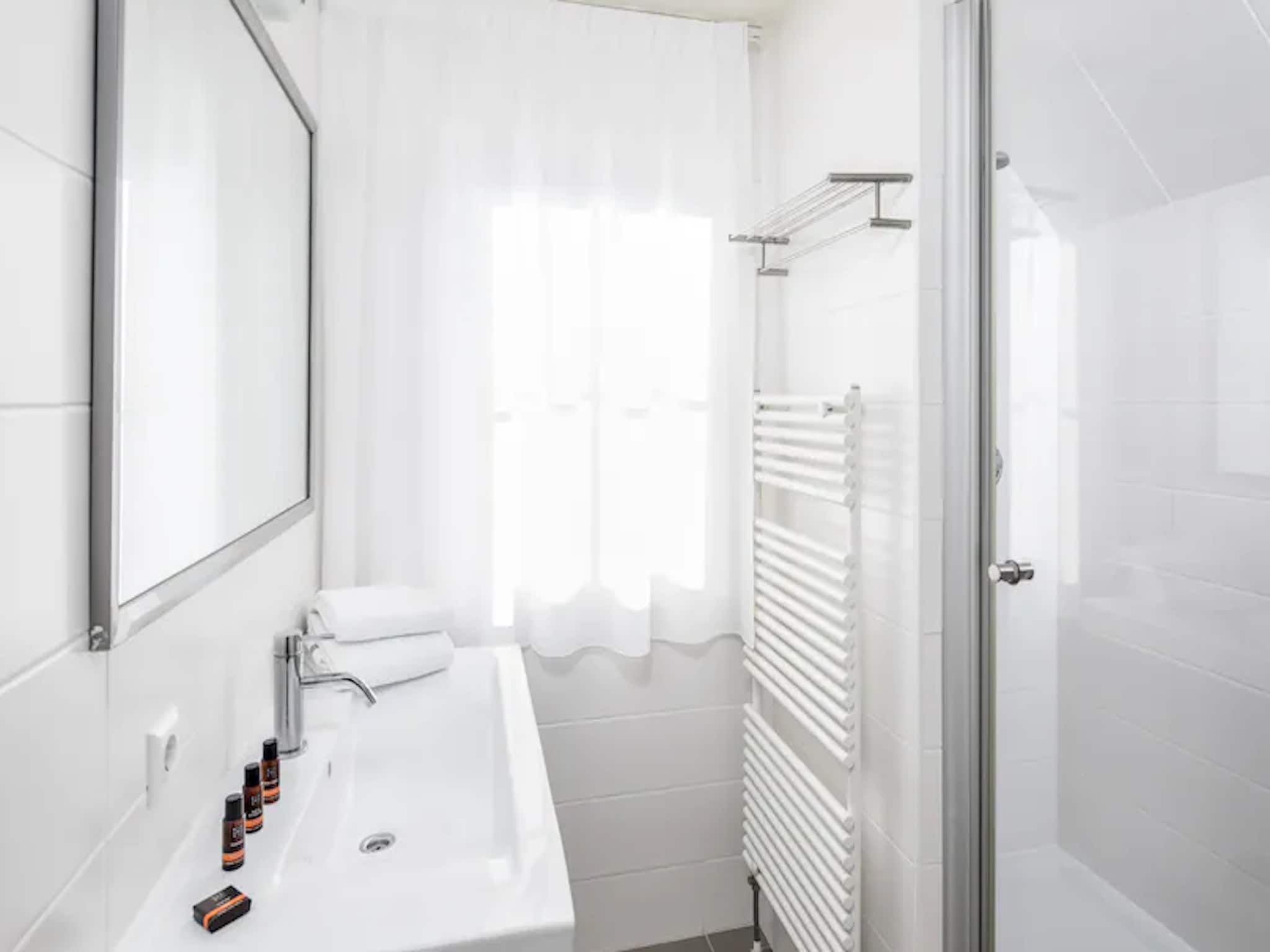 De badkamer van Noordzee Residence Cadzand-Bad 22 in Cadzand-Bad