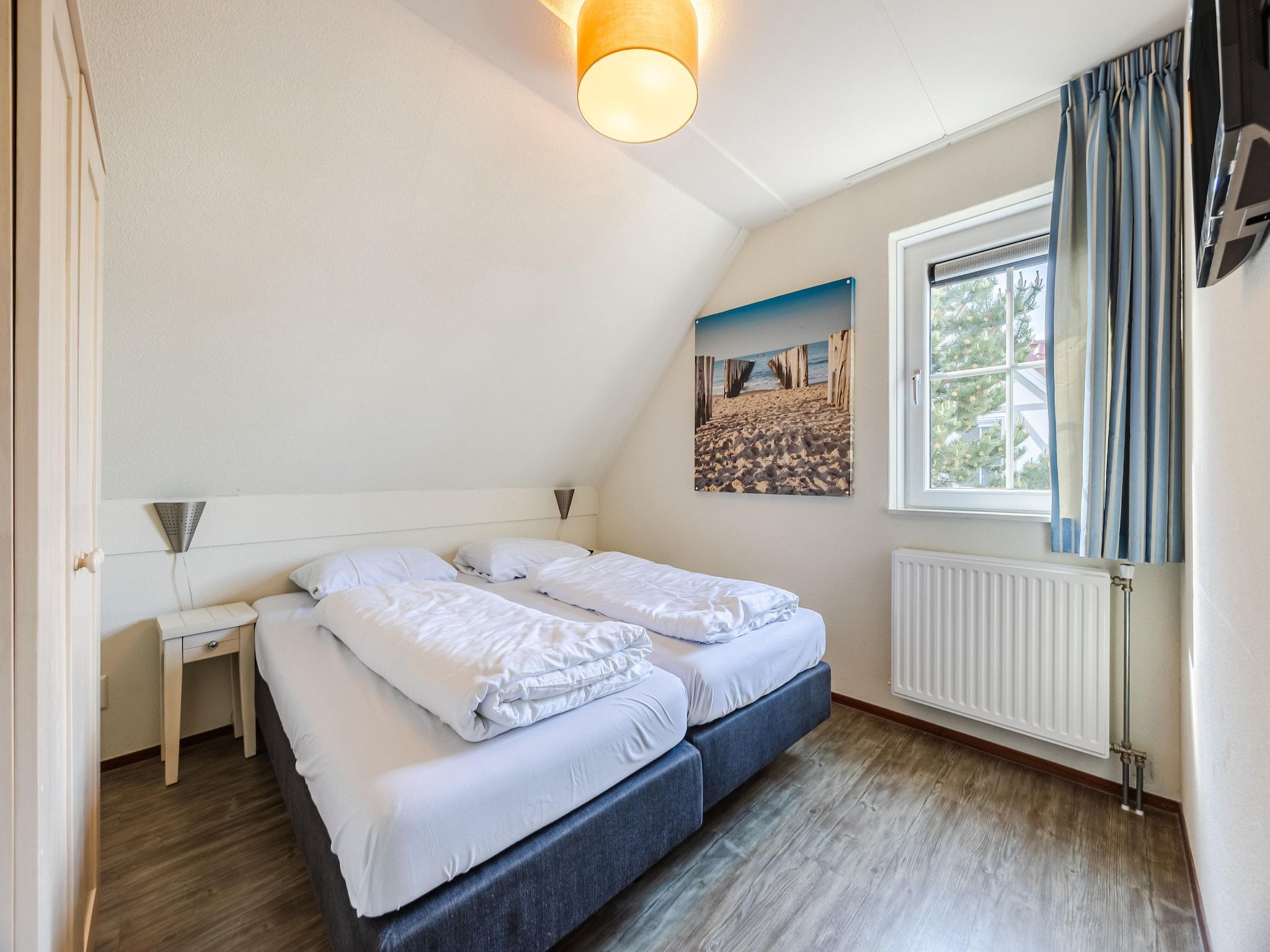 Een slaapkamer van Noordzee Residence Cadzand-Bad 23 in Cadzand-Bad