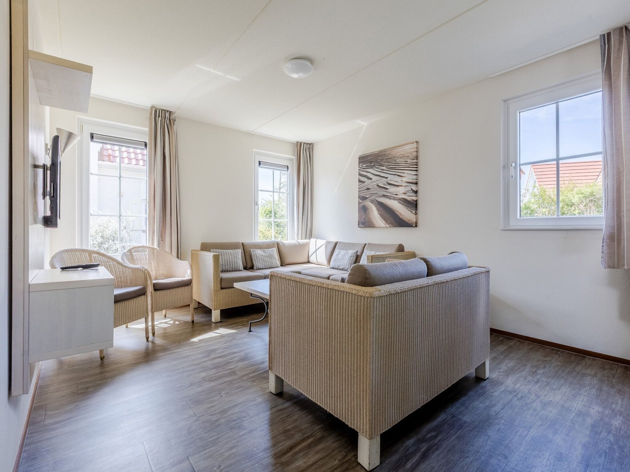 De woonkamer van Noordzee Residence Cadzand-Bad 26 in Cadzand-Bad