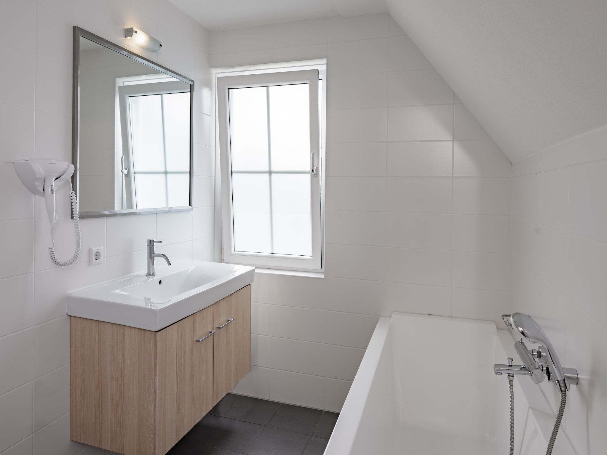 De badkamer van Noordzee Résidence Cadzand-Bad 28 in Cadzand-Bad