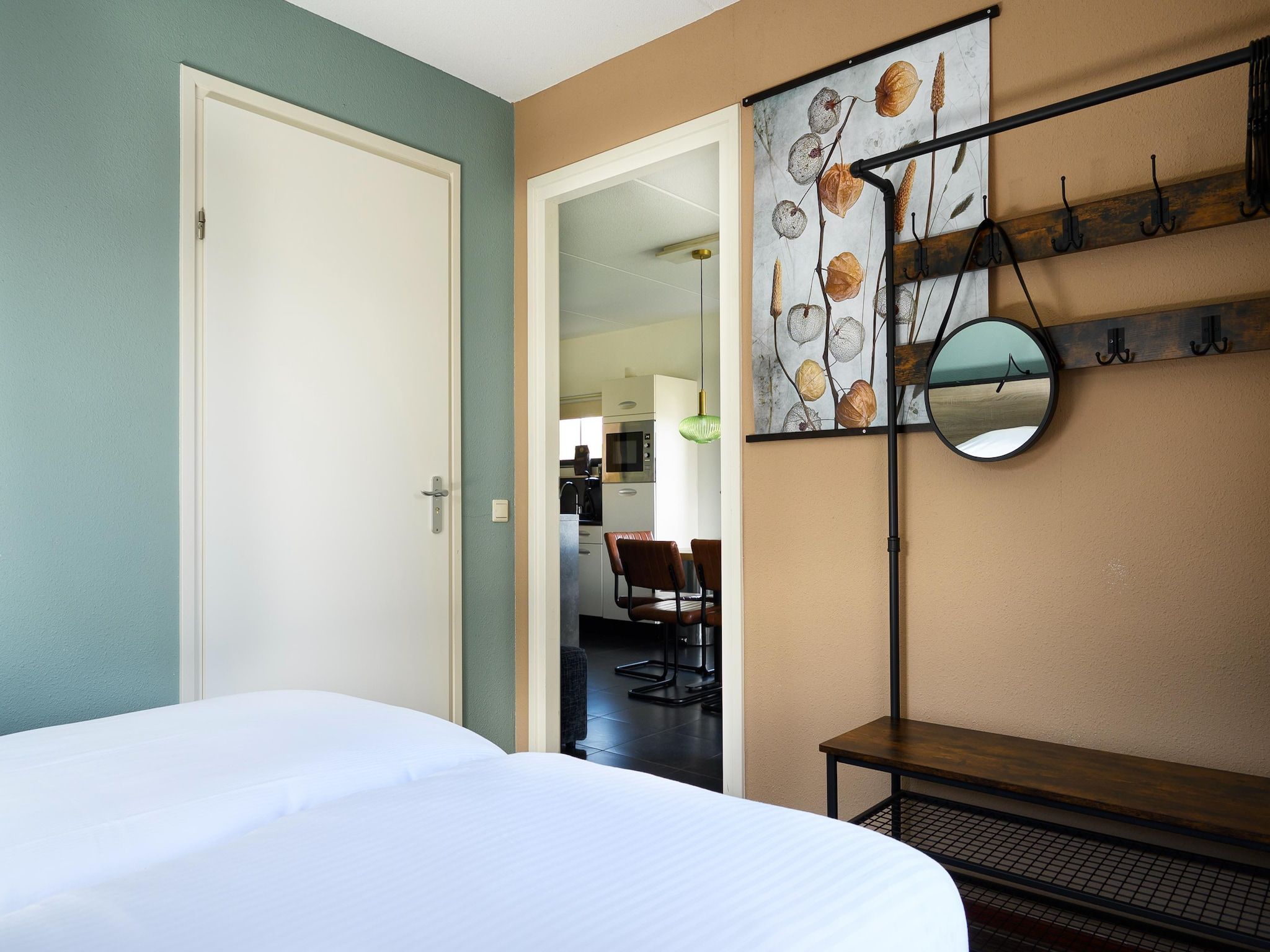 Een slaapkamer van 10 pers Lieskehuis Wellness de luxe met sauna buitenspa in Groningen