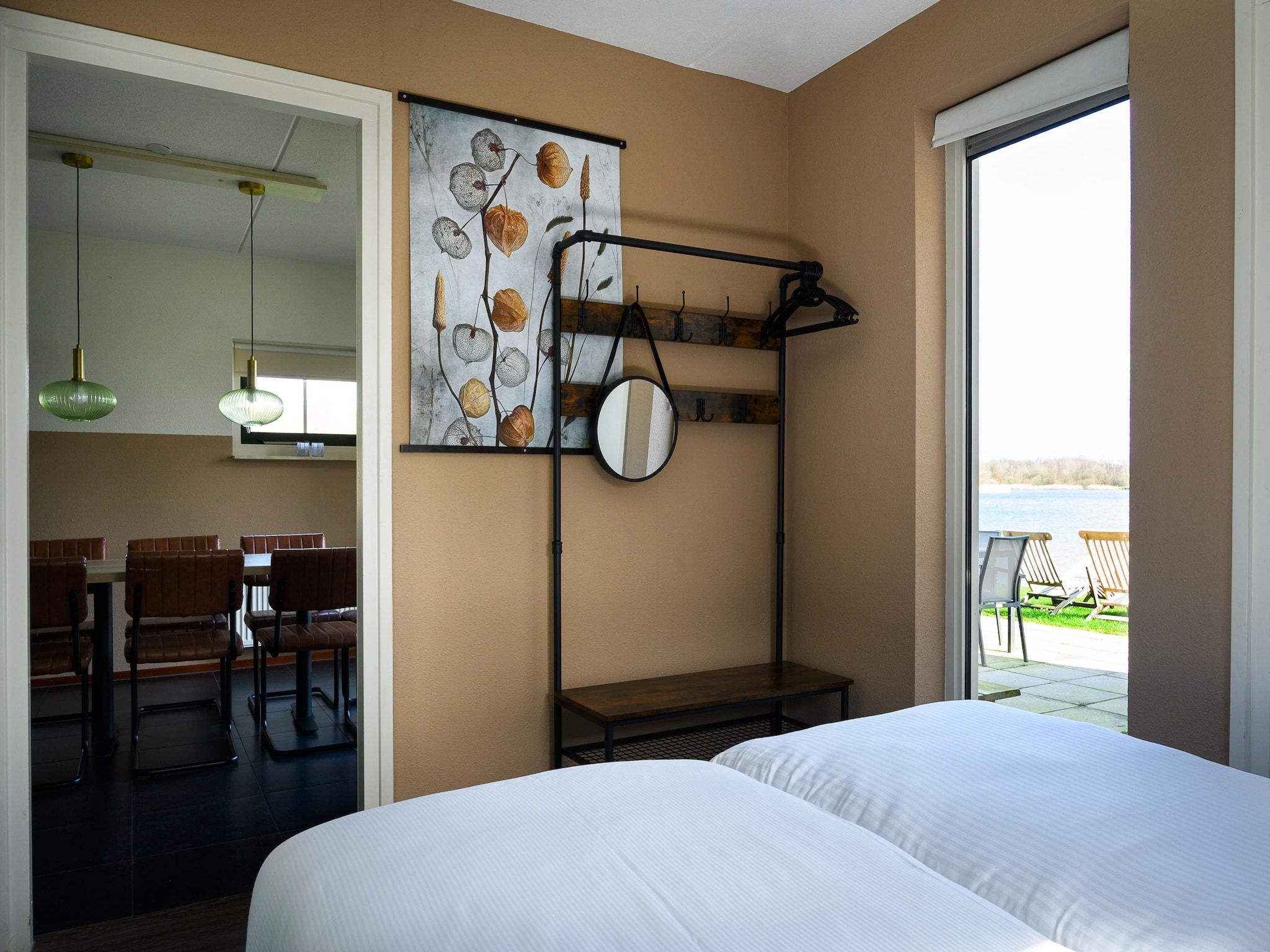 Een slaapkamer van 10 pers Lieskehuis Wellness de luxe met sauna buitenspa in Groningen