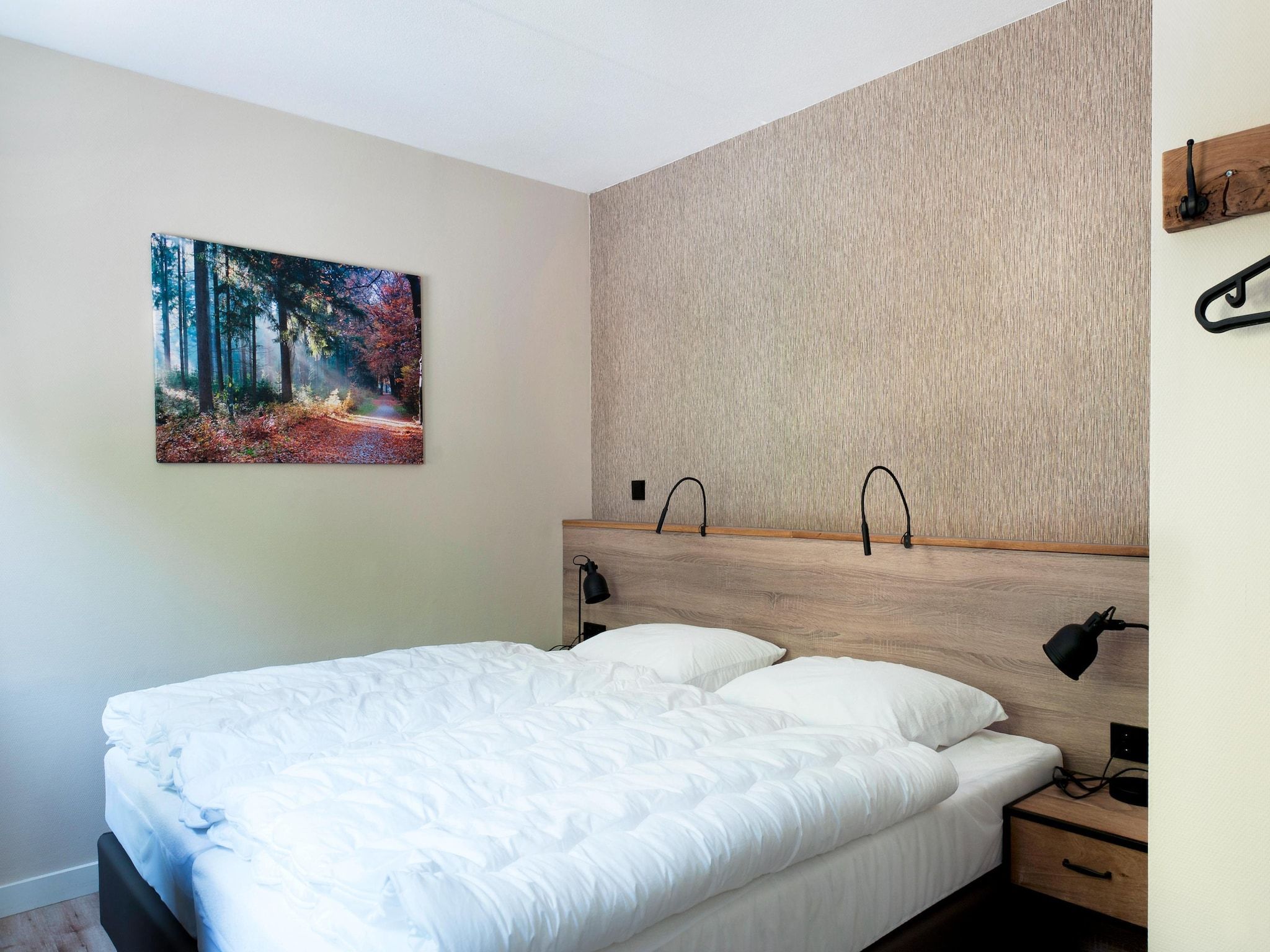 Een slaapkamer van 8 pers Metbroekhuis Wellness de luxe met sauna & buitenspa in Groningen