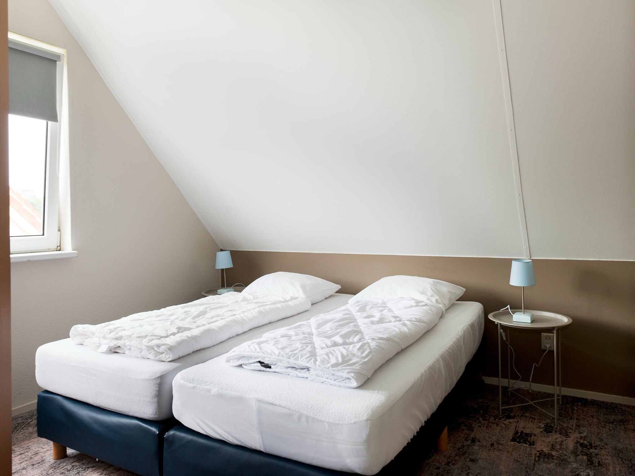 Een slaapkamer van 6 pers Renneborghuis Wellness Comfort met sauna in Groningen