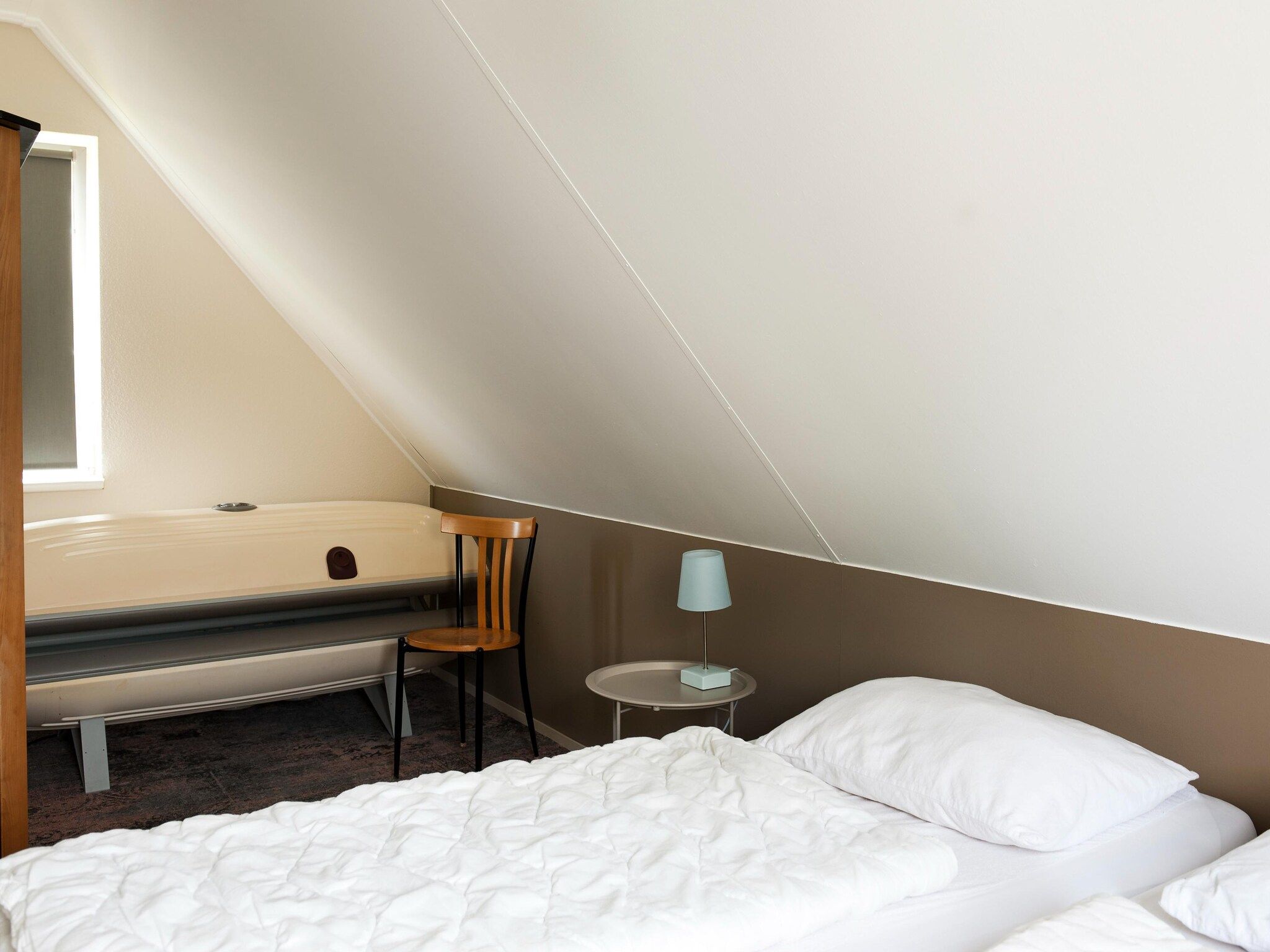 Een slaapkamer van 6 pers Renneborghuis Wellness Comfort met sauna in Groningen