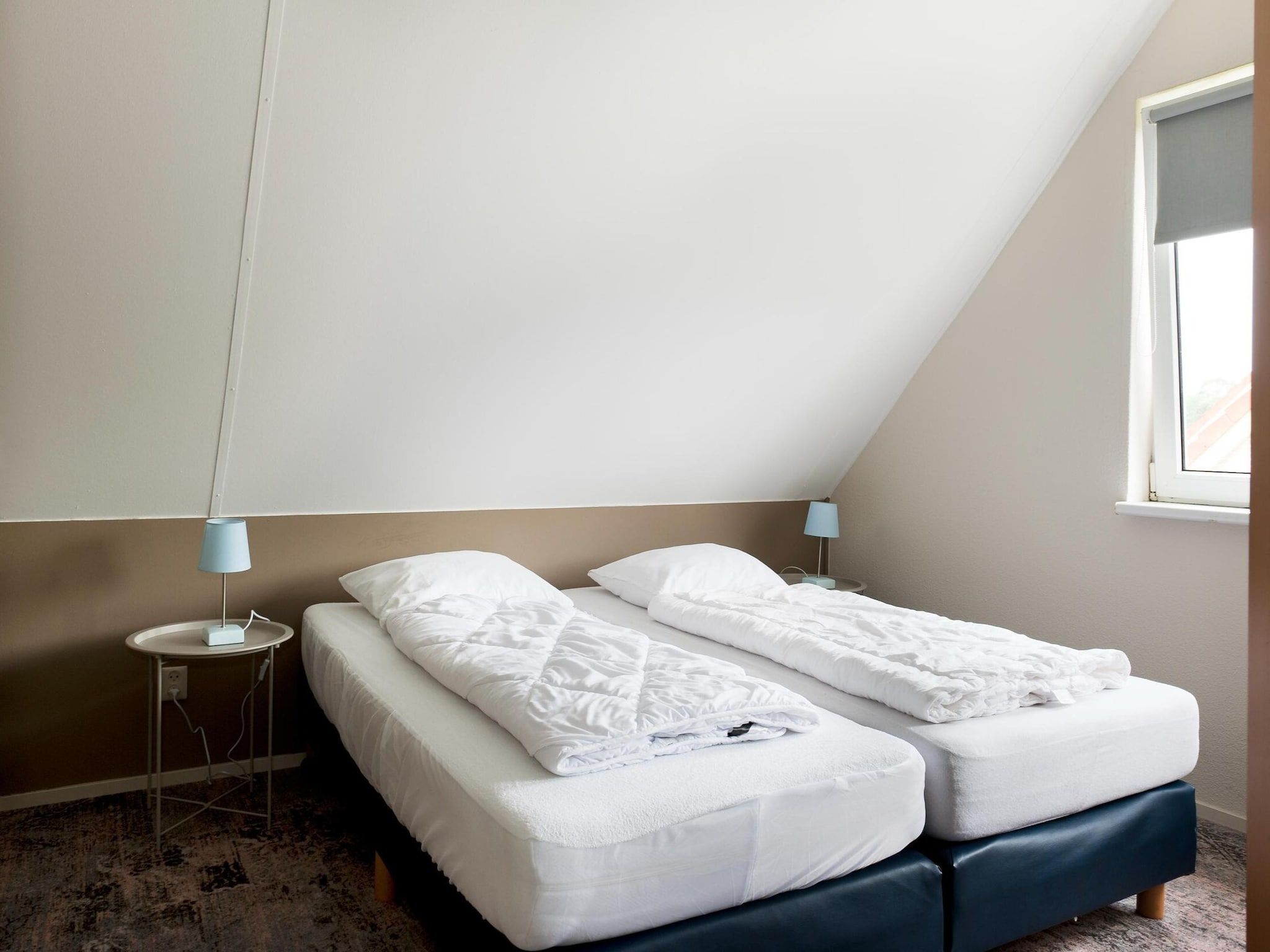 Een slaapkamer van 6 pers Renneborghuis Wellness Comfort met sauna in Groningen