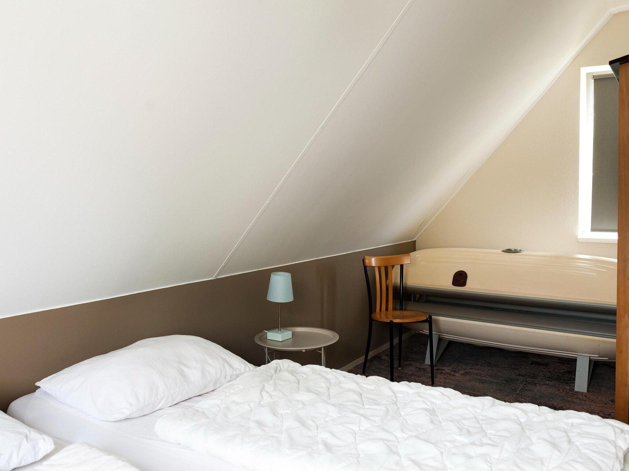 Een slaapkamer van 6 pers Renneborghuis Wellness Comfort met sauna in Groningen