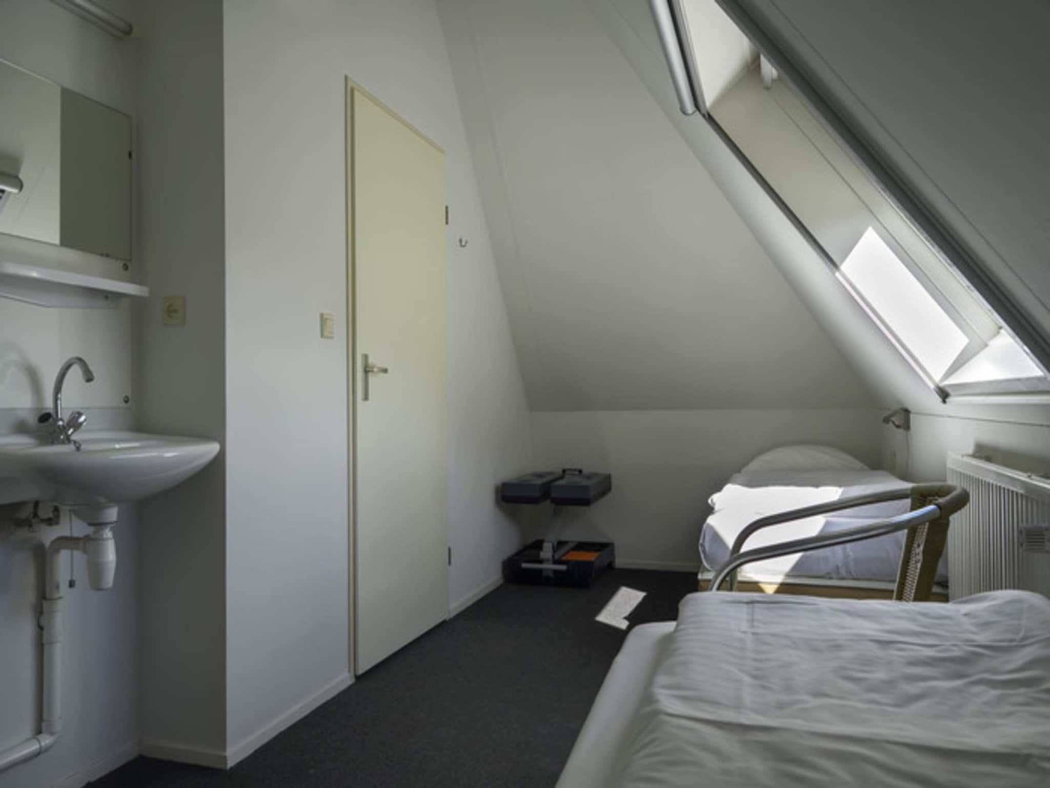 Een slaapkamer van Skip Wellness de luxe met sauna in Friesland