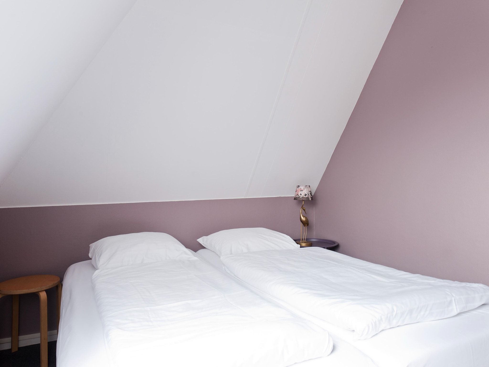 Een slaapkamer van Tobke Wellness de luxe VIP met sauna met buitenspa in Friesland