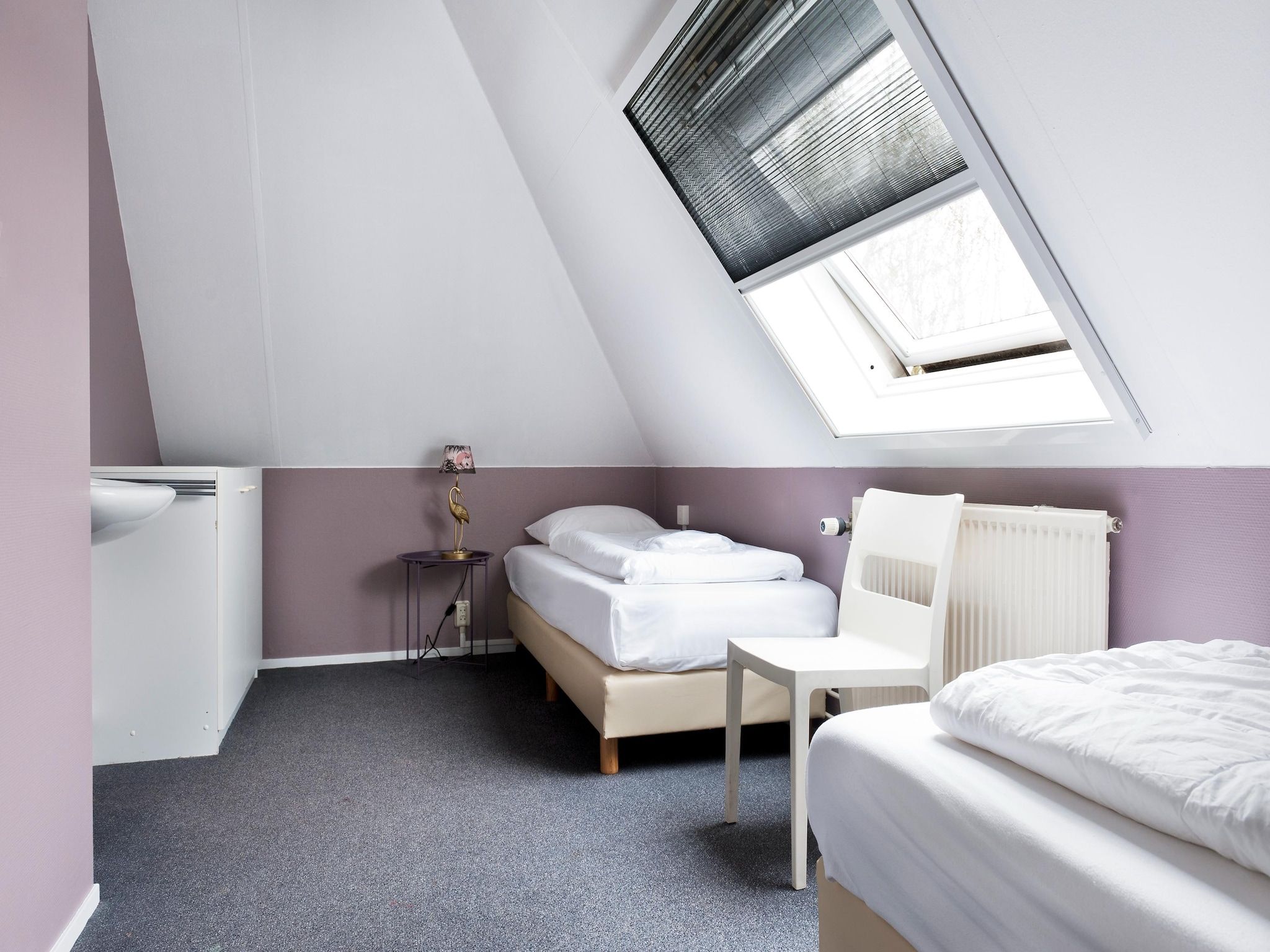 Een slaapkamer van Tobke Wellness de luxe VIP met sauna met buitenspa in Friesland