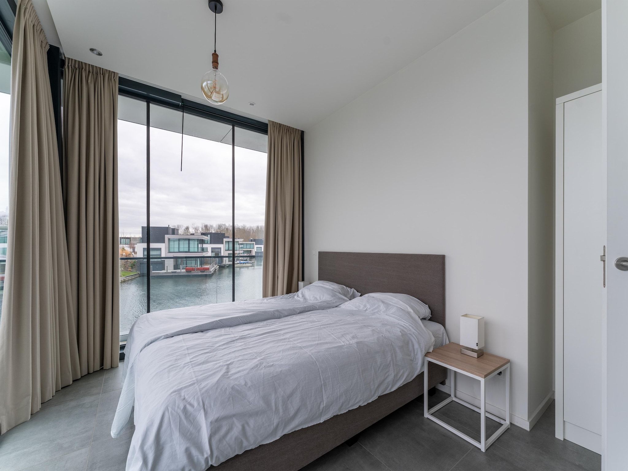 Een slaapkamer van Harbour Village 15 in Arnemuiden