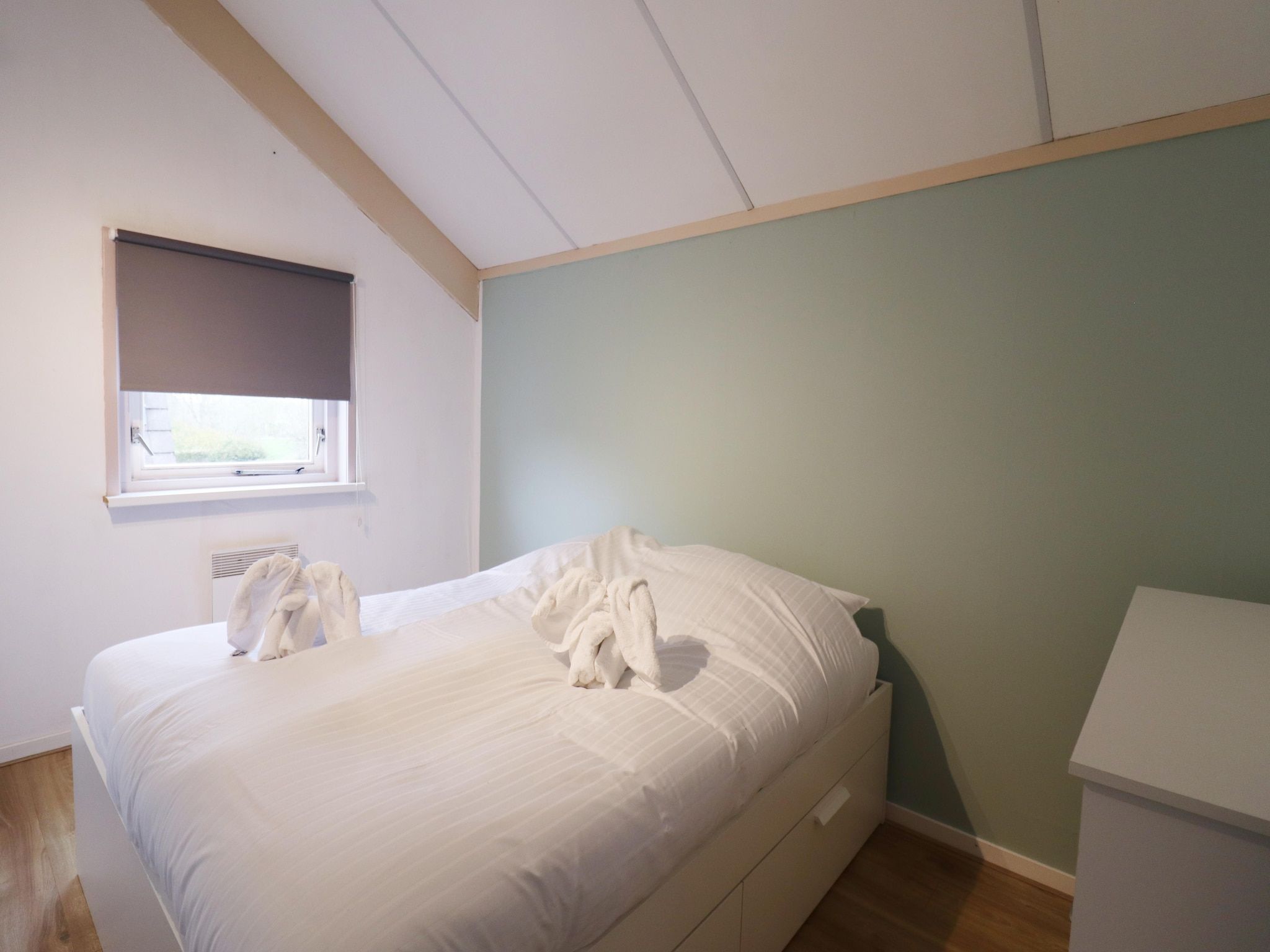 Een slaapkamer van Combinatie nr 105 en 110 in Grou