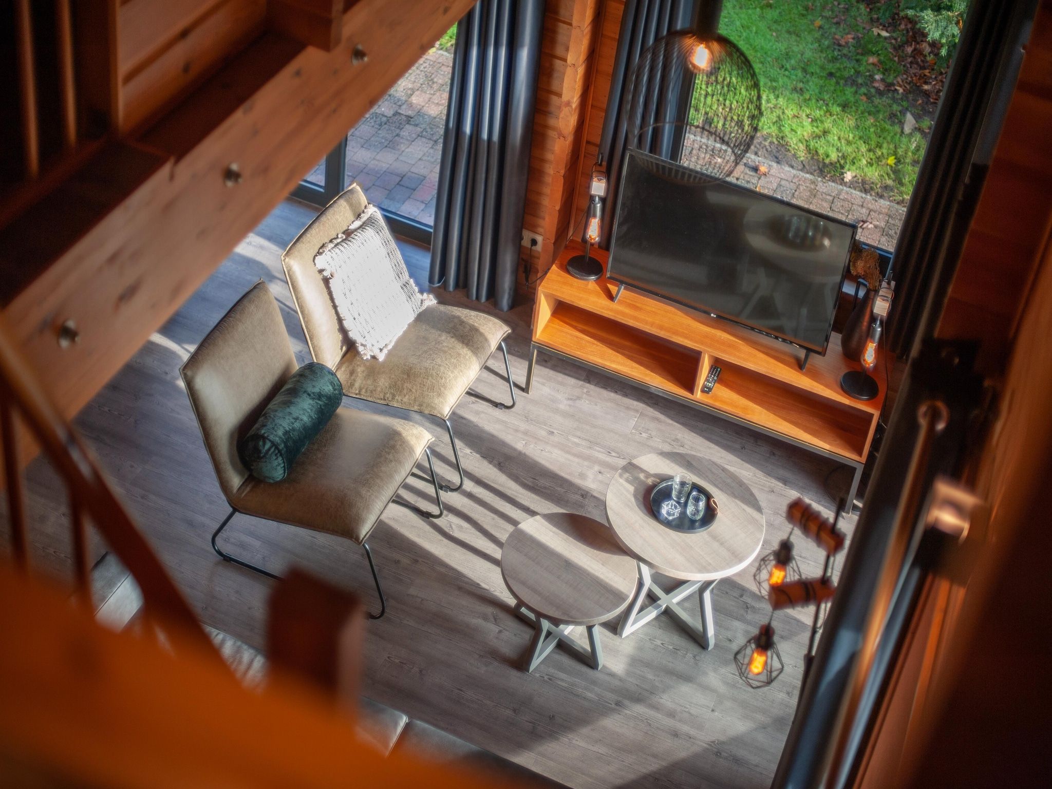 De woonkamer van Vakantiepark Klein Vink 22 in Arcen