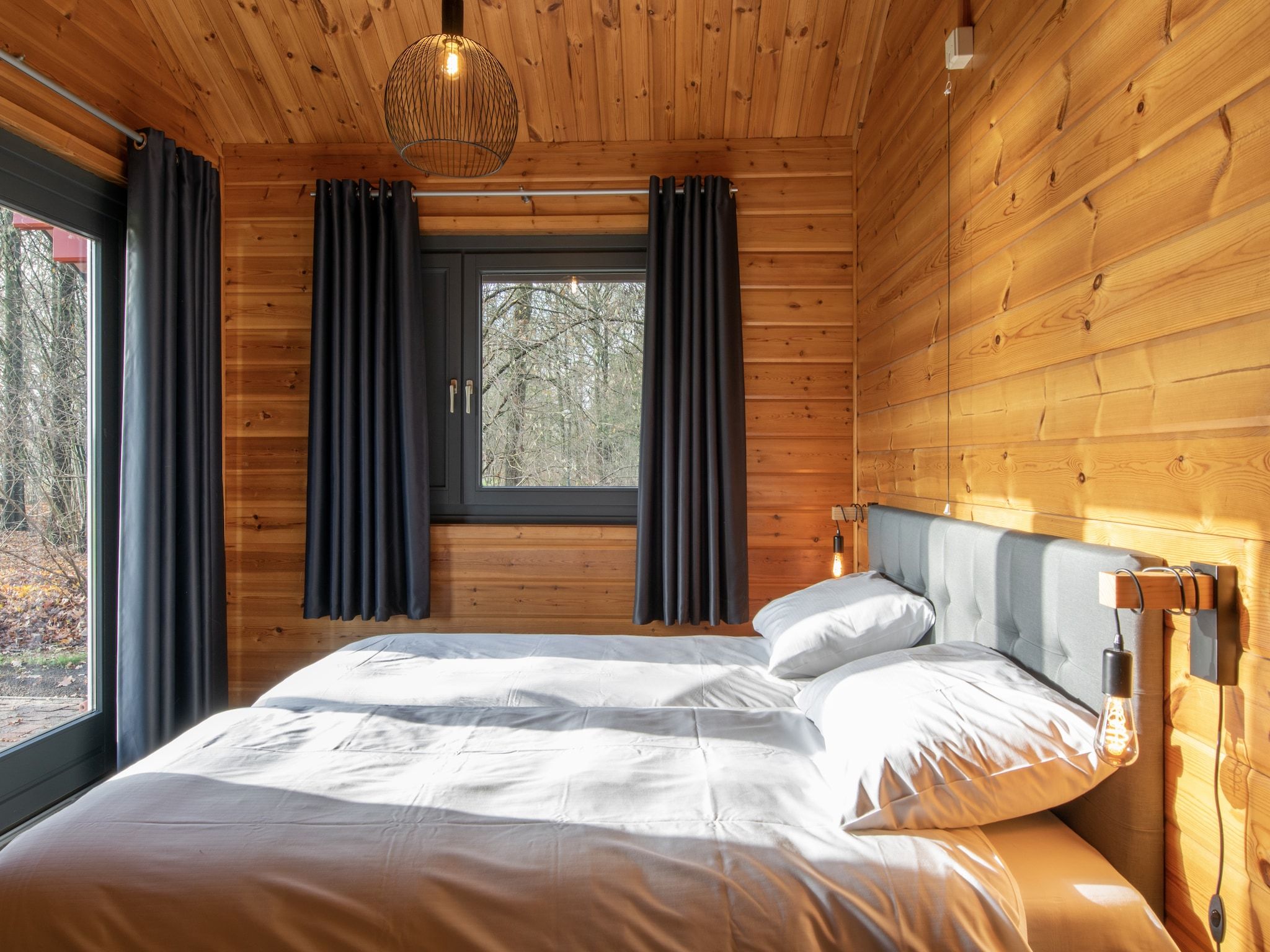 Een slaapkamer van Vakantiepark Klein Vink 22 in Arcen