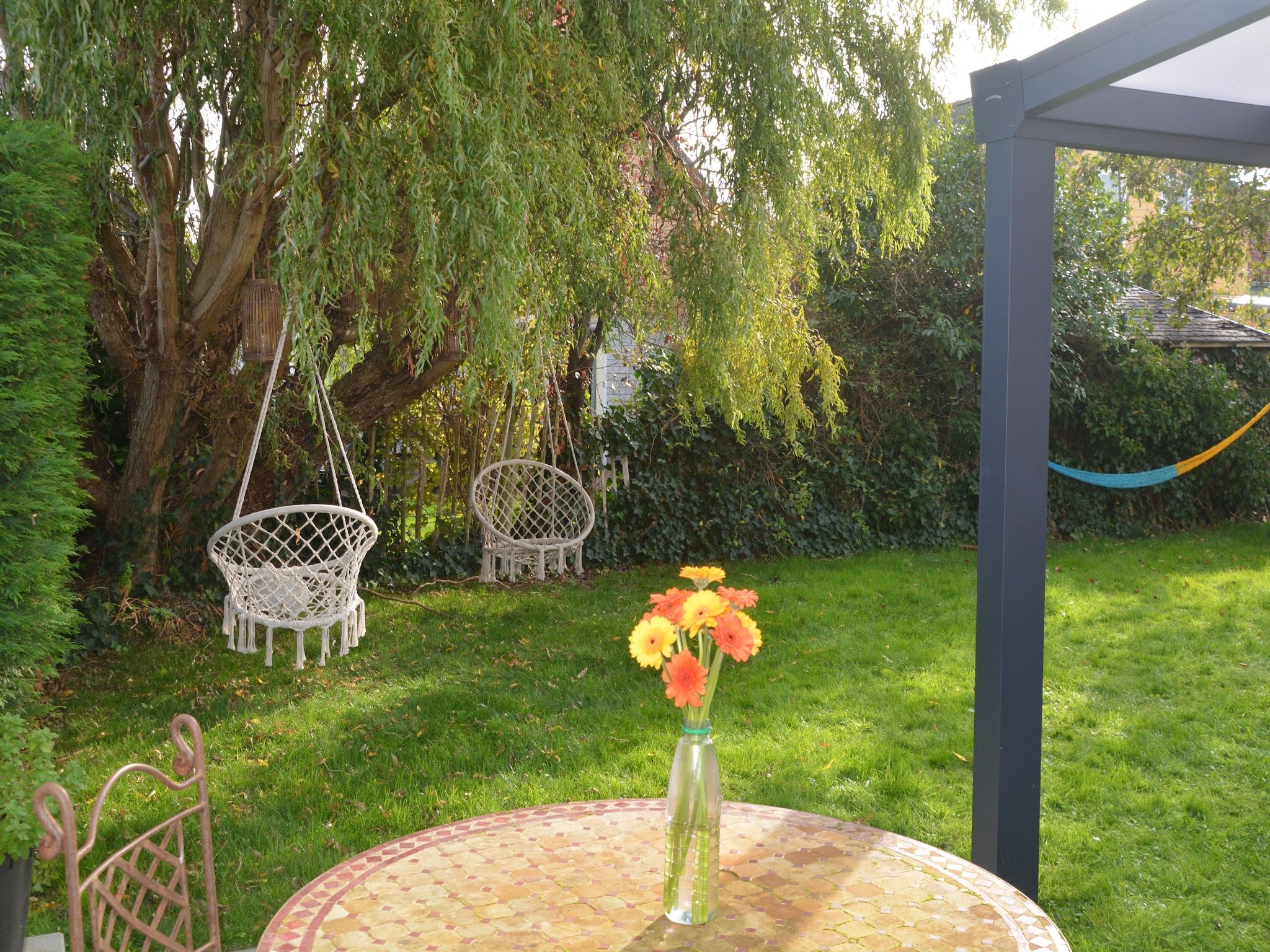 De tuin van Villapark De Oesterbaai 110 in Wemeldinge