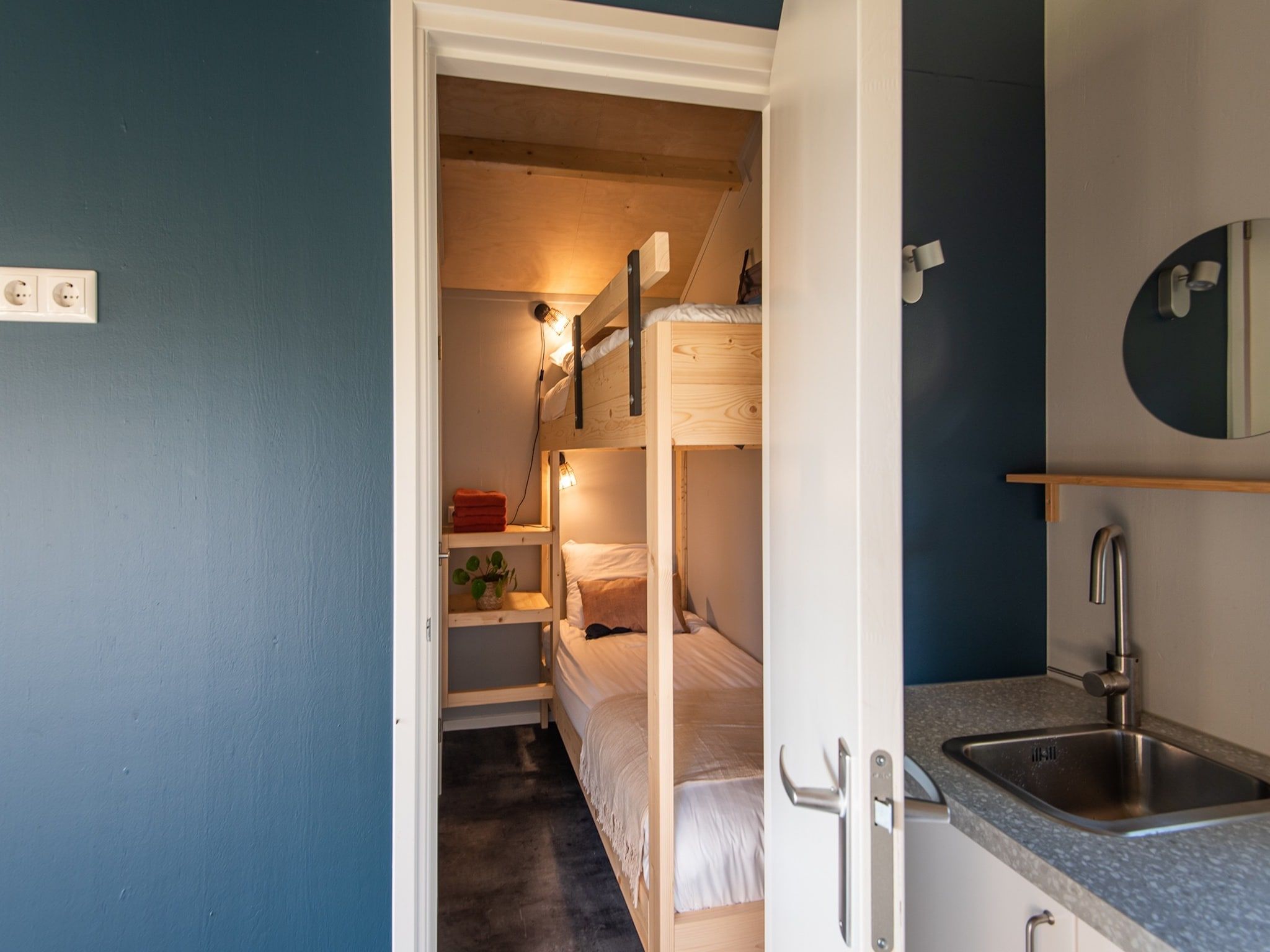 Een slaapkamer van Acker Lodges 3 in Ruinerwold