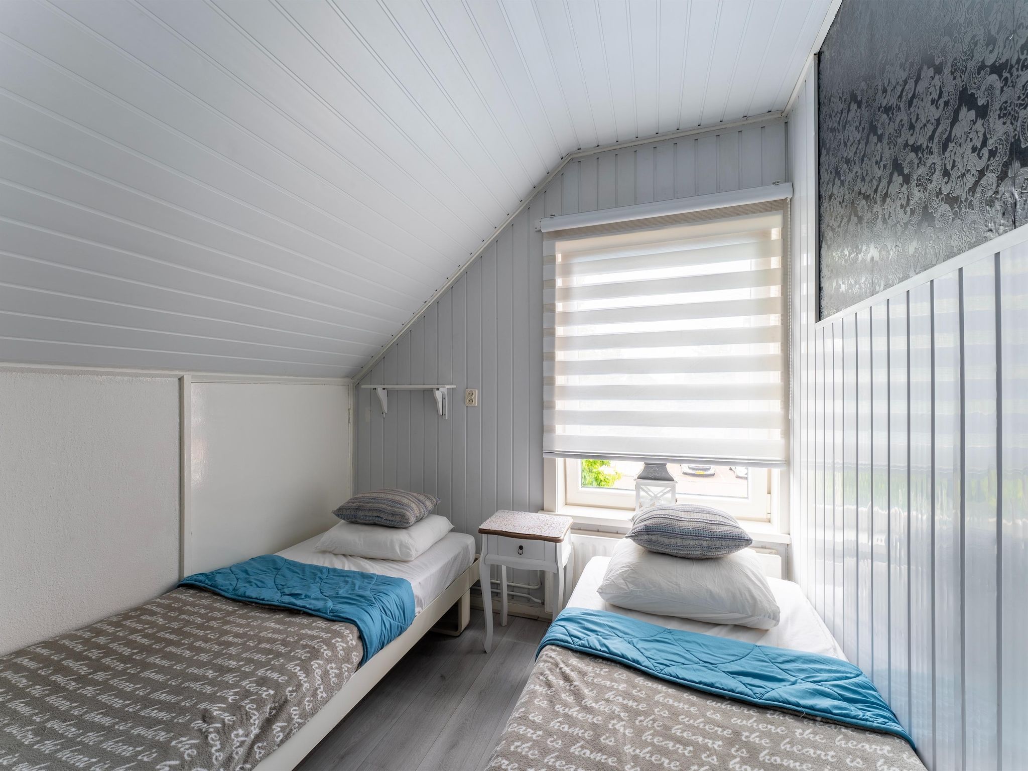 Een slaapkamer van Vakantiewoning Aarab in Vlissingen