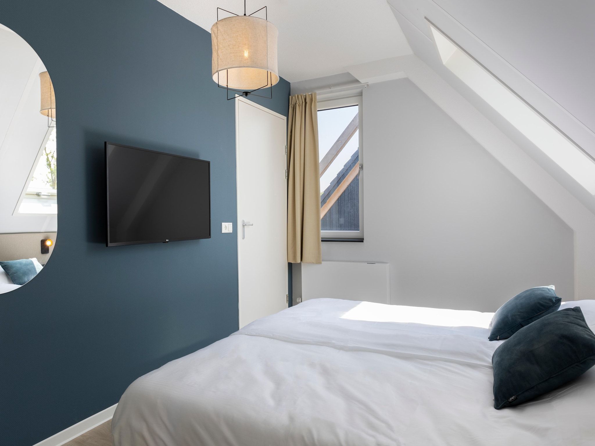 Een slaapkamer van Resort Nieuwvliet-Bad 10 in Nieuwvliet