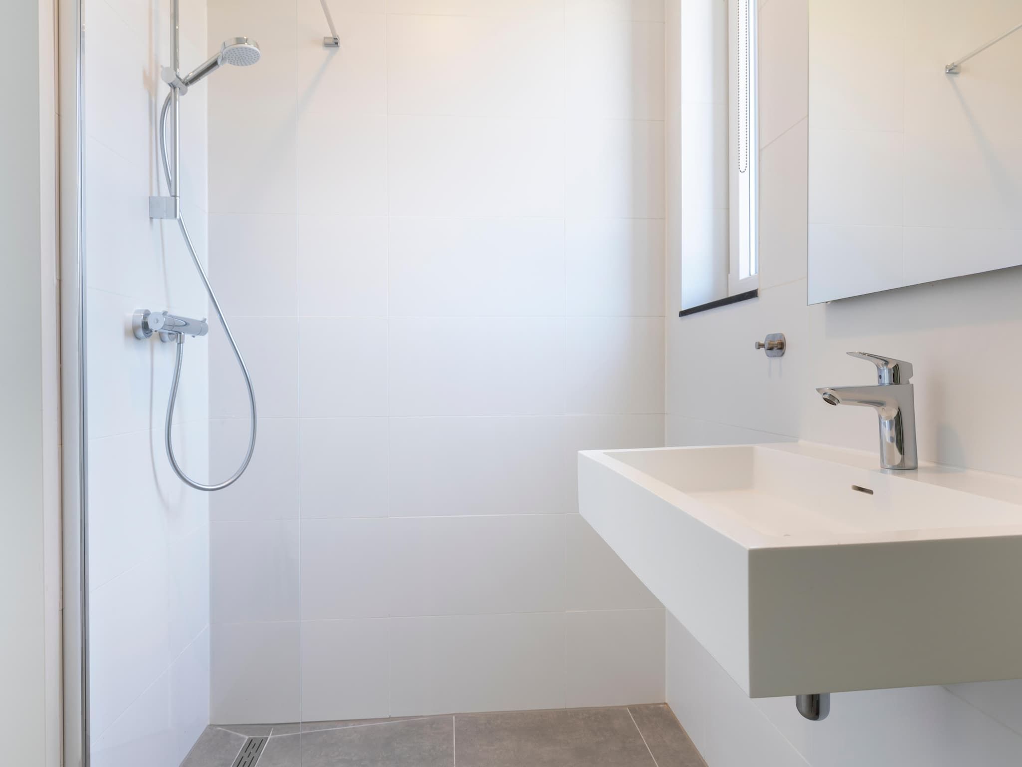 De badkamer van Resort Nieuwvliet-Bad 10 in Nieuwvliet