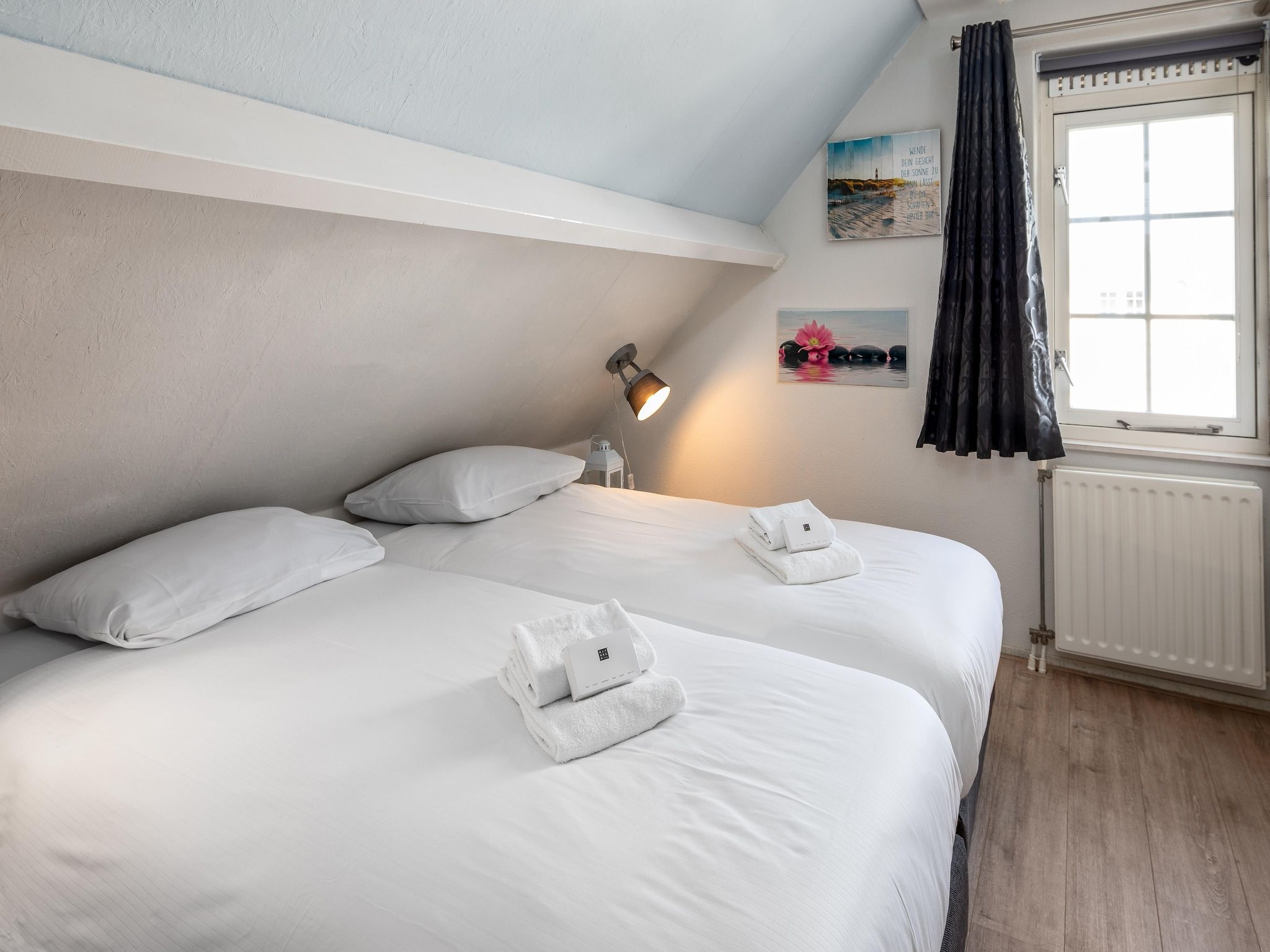 Een slaapkamer van Buitenhof Domburg  16 in Domburg