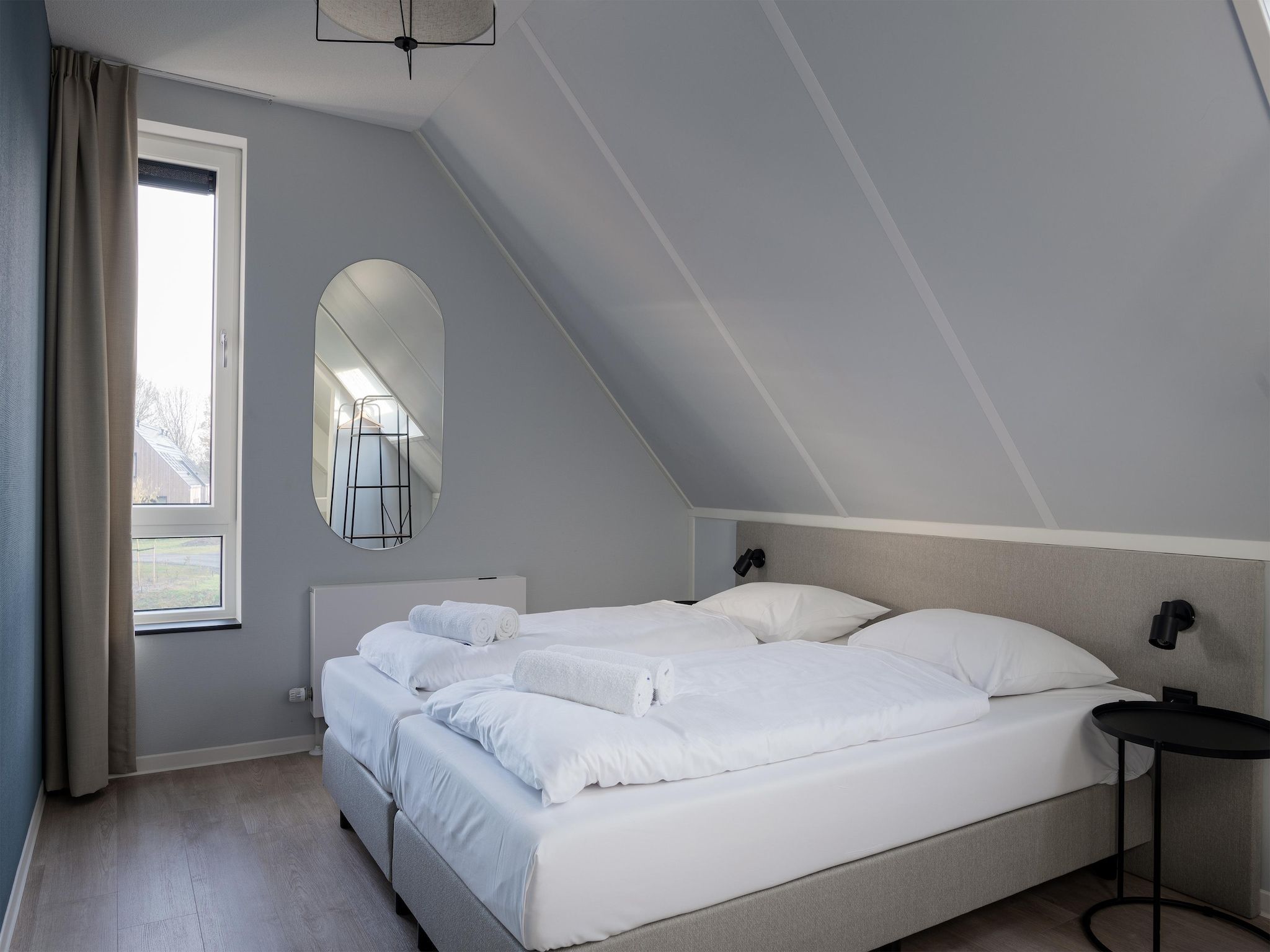 Een slaapkamer van Resort Nieuwvliet-Bad 11 in Nieuwvliet