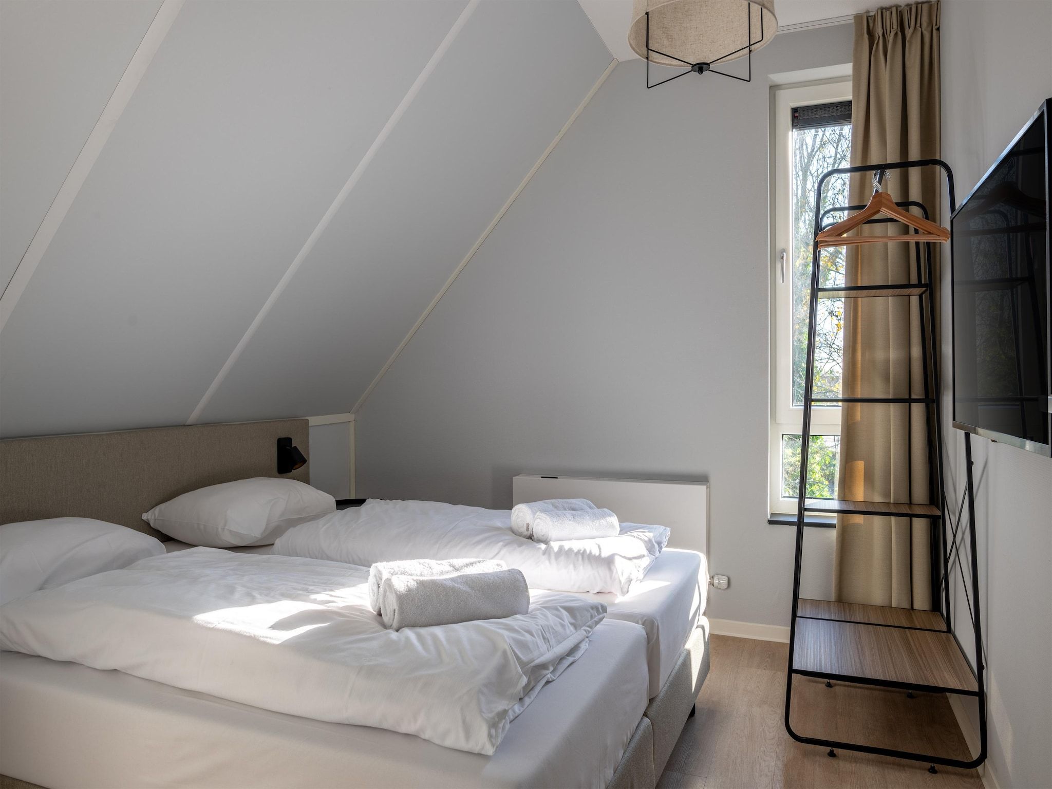 Een slaapkamer van Resort Nieuwvliet-Bad 11 in Nieuwvliet