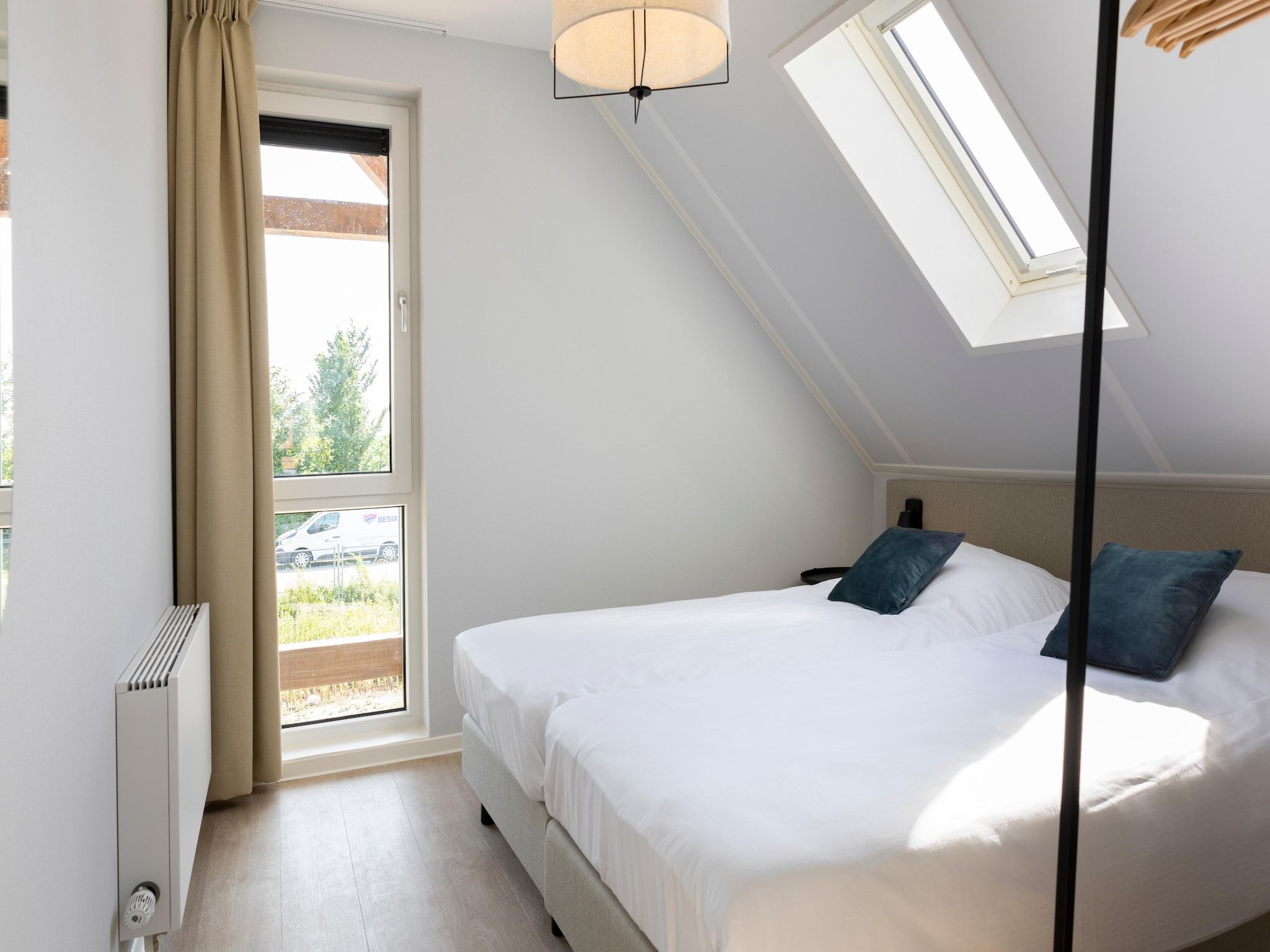 Een slaapkamer van Resort Nieuwvliet-Bad 12 in Nieuwvliet