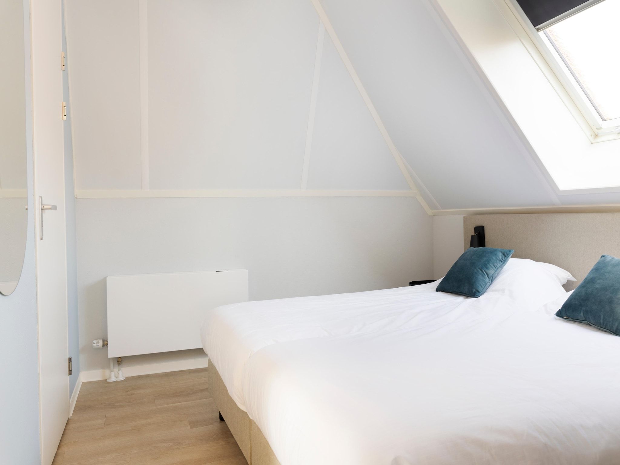 Een slaapkamer van Resort Nieuwvliet-Bad 13 in Nieuwvliet