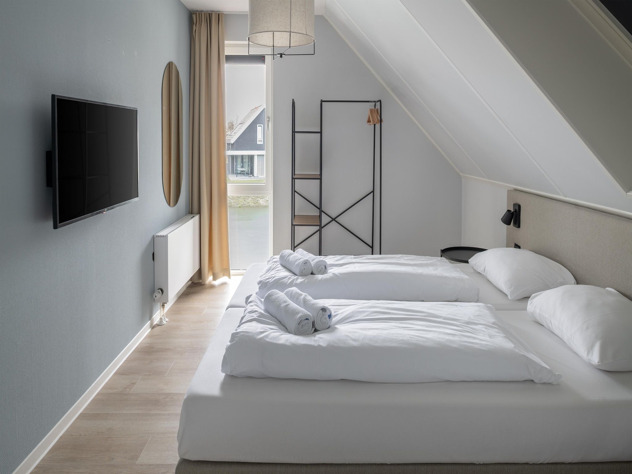 Een slaapkamer van Resort Nieuwvliet-Bad 14 in Nieuwvliet