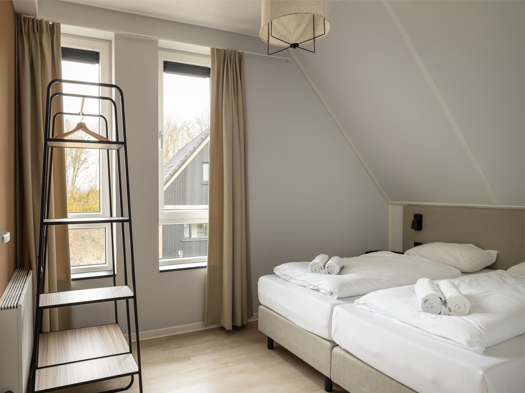 Een slaapkamer van Resort Nieuwvliet-Bad 15 in Nieuwvliet