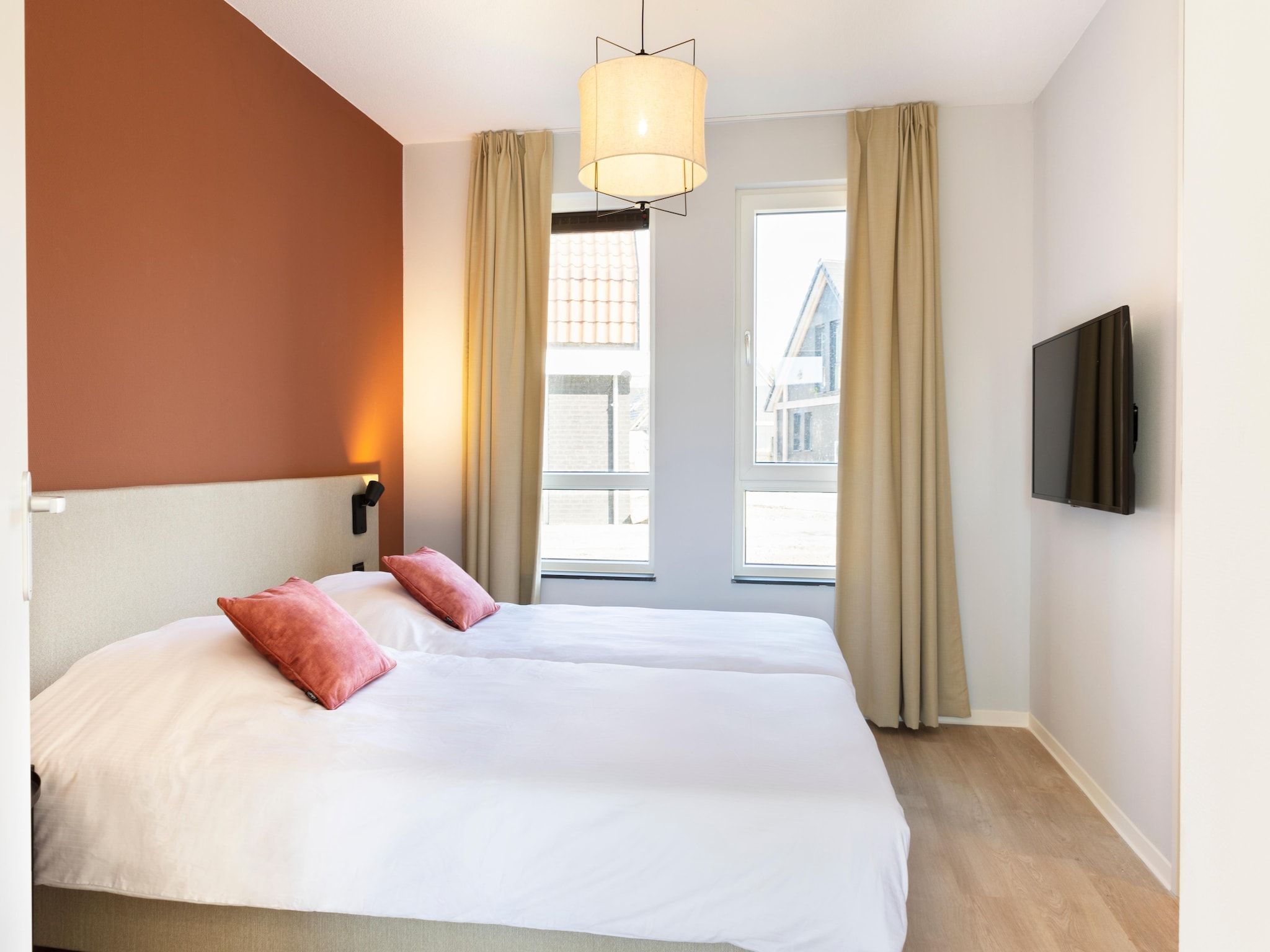 Een slaapkamer van Resort Nieuwvliet-Bad 19 in Nieuwvliet