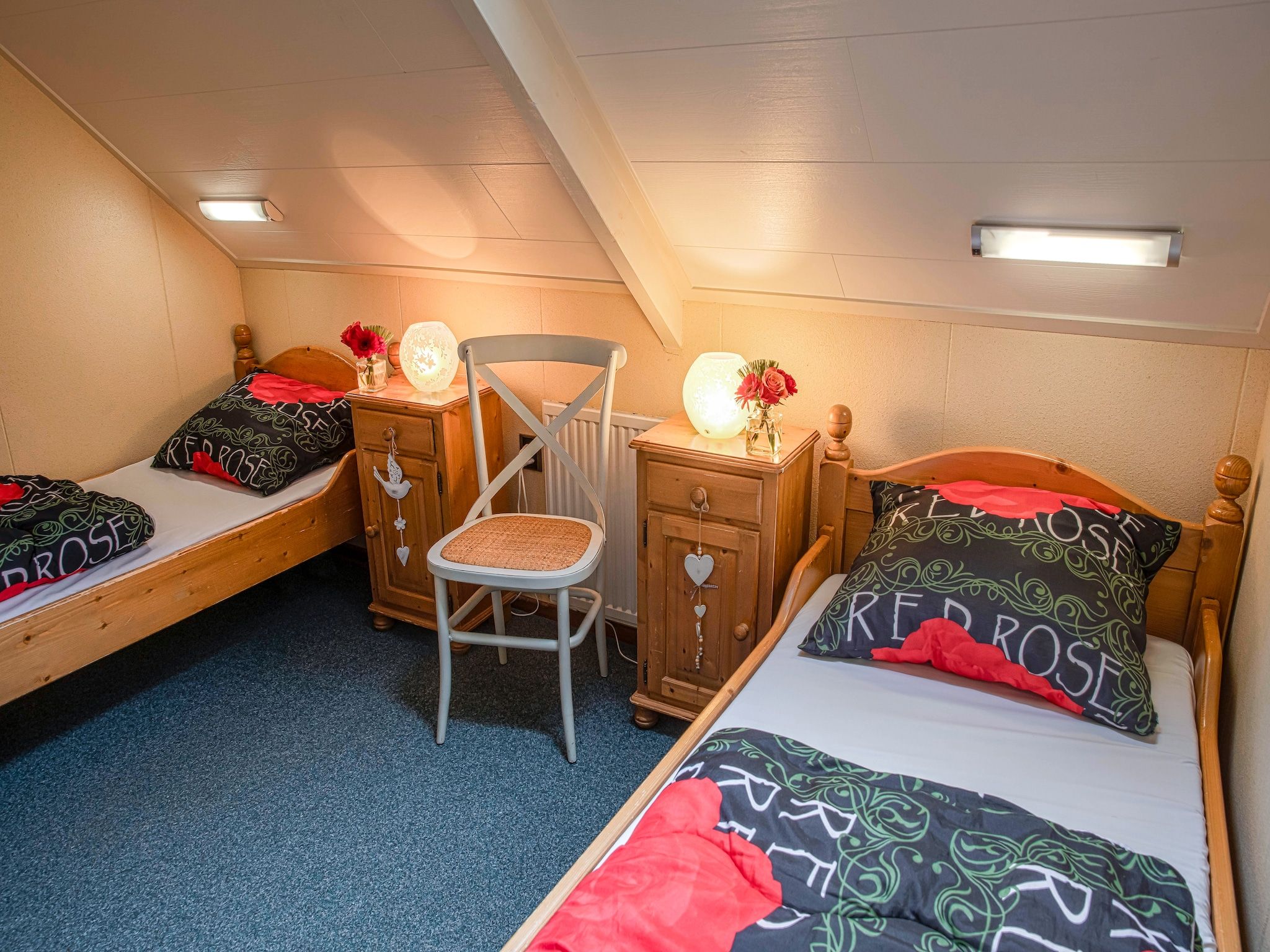 Een slaapkamer van De Familieboerderij in Losser